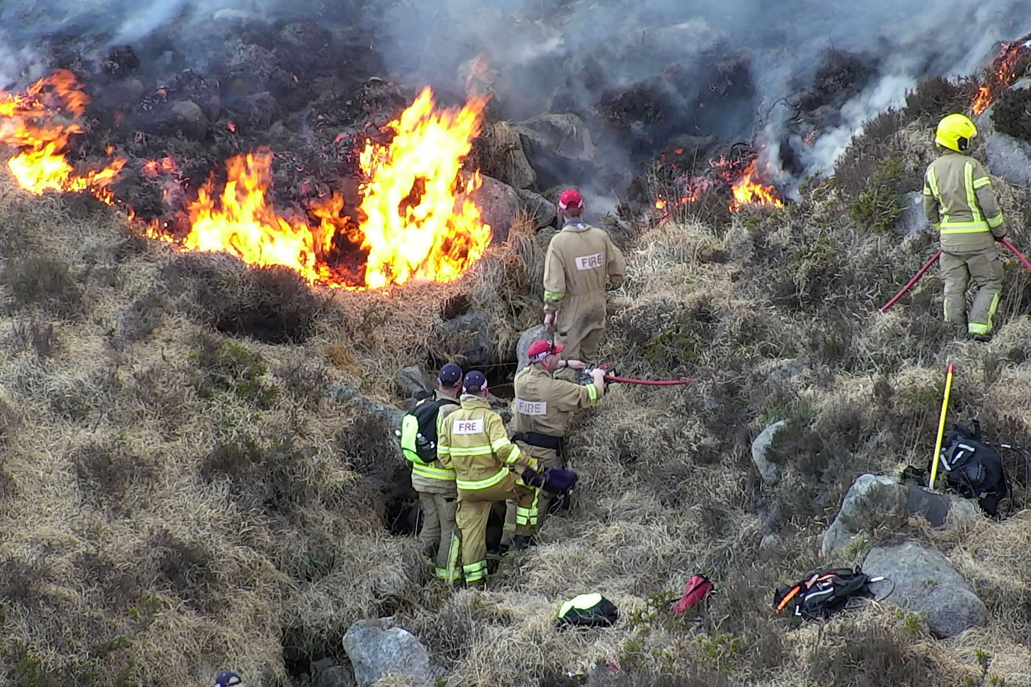 Undated handout photo issued by Northern Ireland Fire and Rescue Service (NIFRS) of firefighters have been tackling a significant wildfire in the Mourne Mountains in Co Down. It comes after a major incident was declared at the weekend following a large wildfire close to the Mournes led to homes being evacuated. Issue date: Tuesday April 8, 2025.