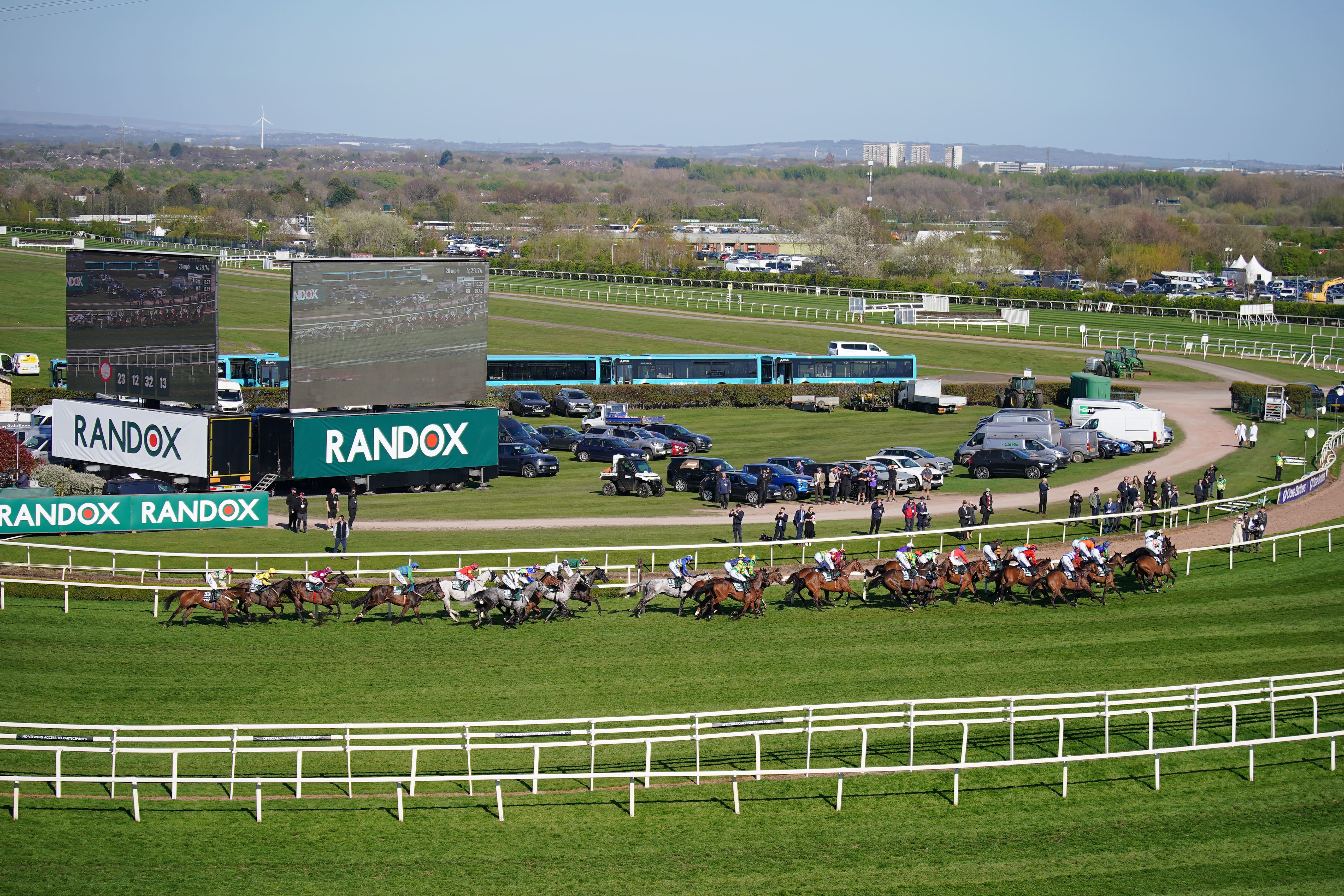 Runners and riders during the Randox Grand National (Peter Byrne/PA)