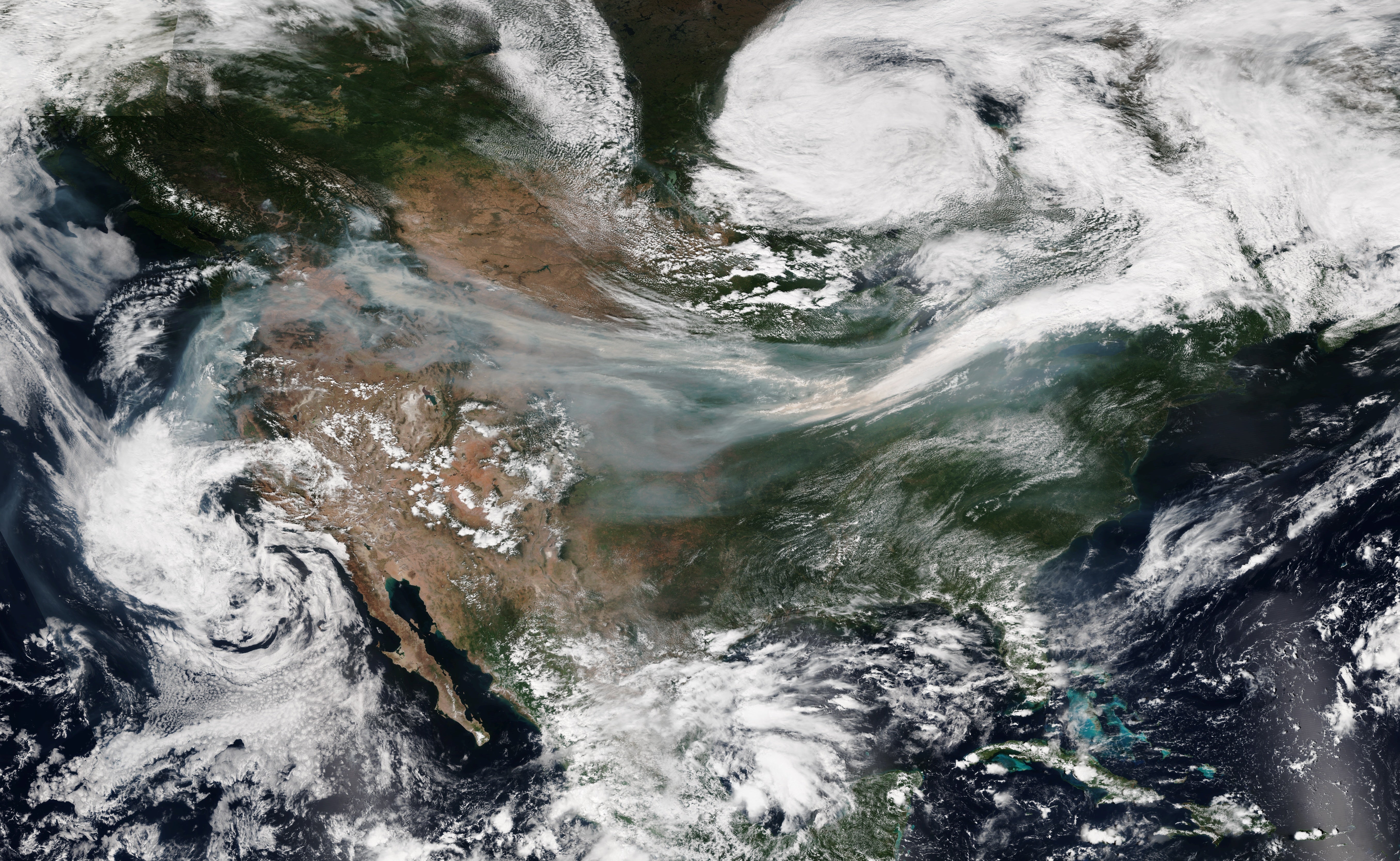Satellite imagery captured wildfire smoke moving across the U.S. in September 2017 when dozens of wildfires burned in the West