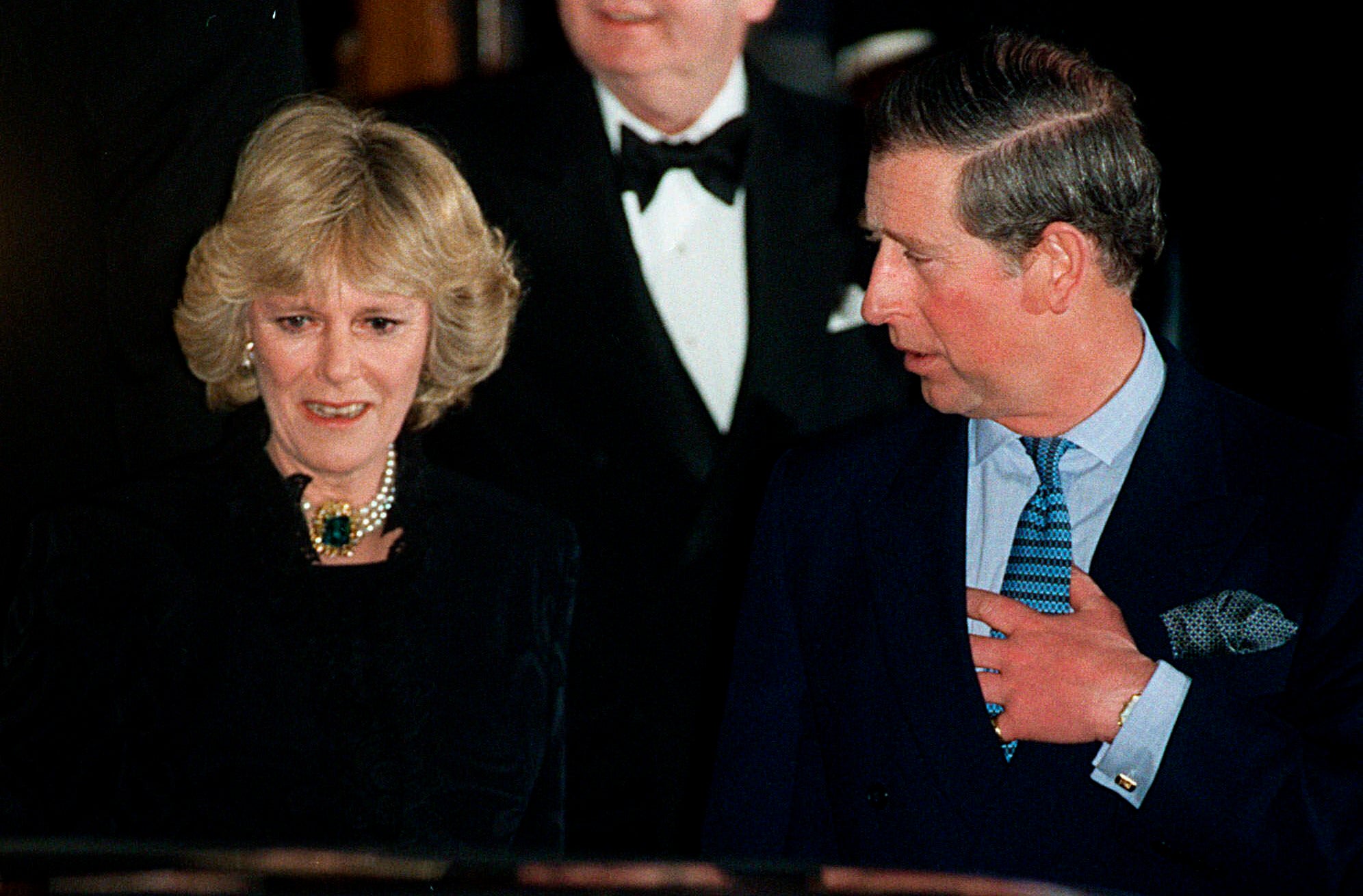 The then-Prince Charles and Camilla Parker Bowles leave the Ritz Hotel in London, the first time that the couple, who had been friends for more than 25 years, appeared together in public, in January 1999