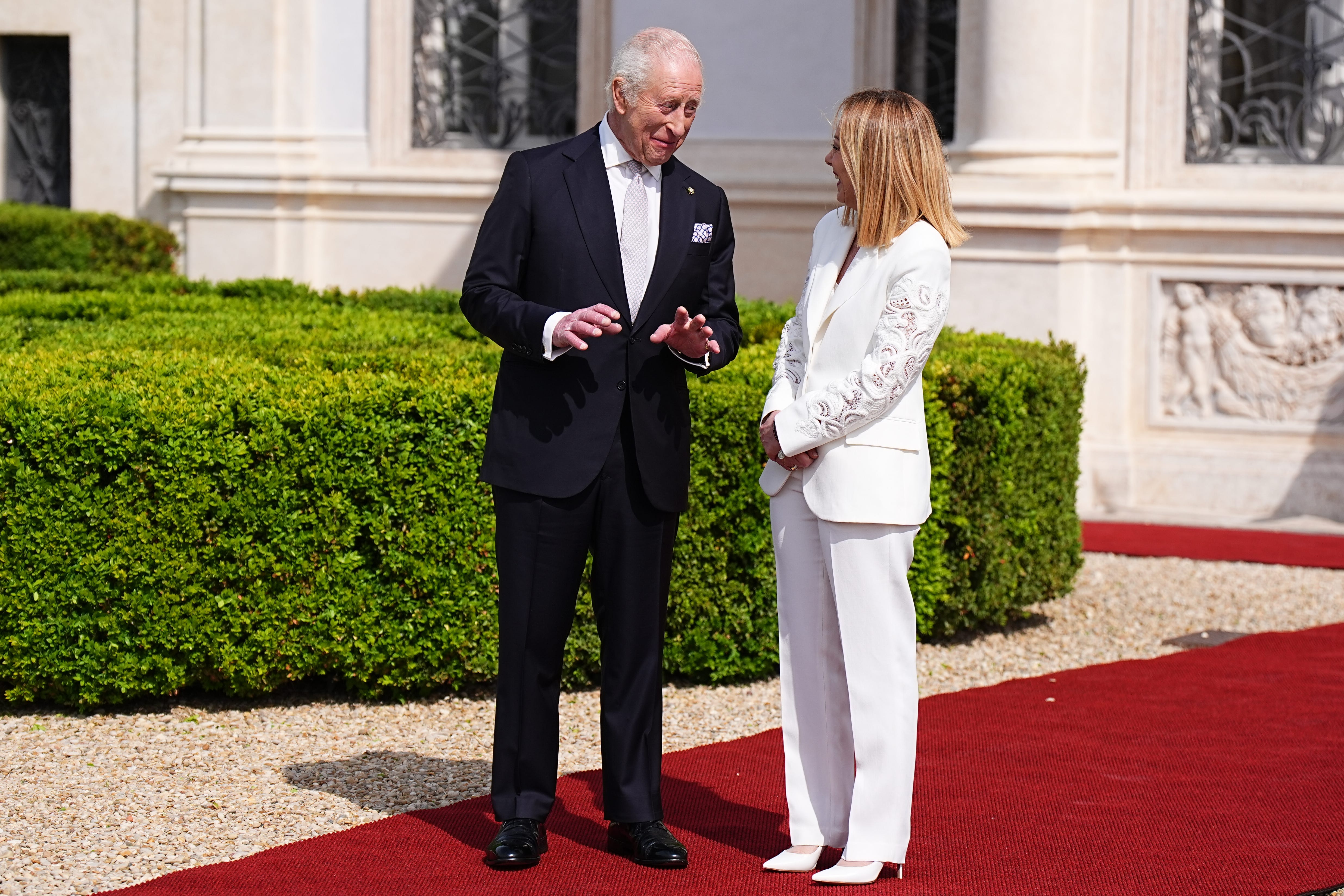 The King talking with Italian Prime Minister Giorgia Meloni at Villa Doria Pamphili, in Rome (Aaron Chown/PA)