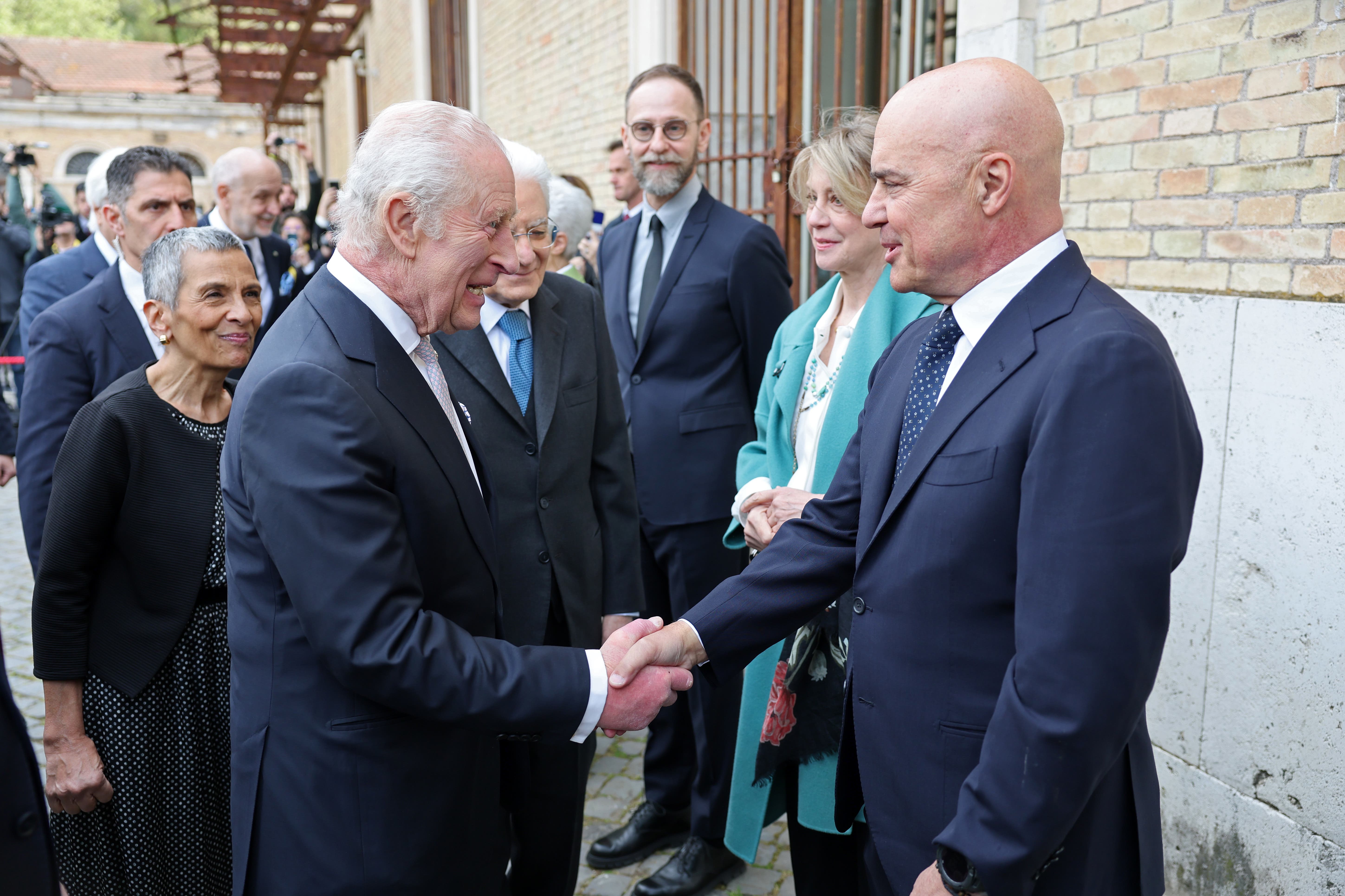 Charles meeting Luca Zingaretti at the Mattatoio, in Rome (Chris Jackson/PA)