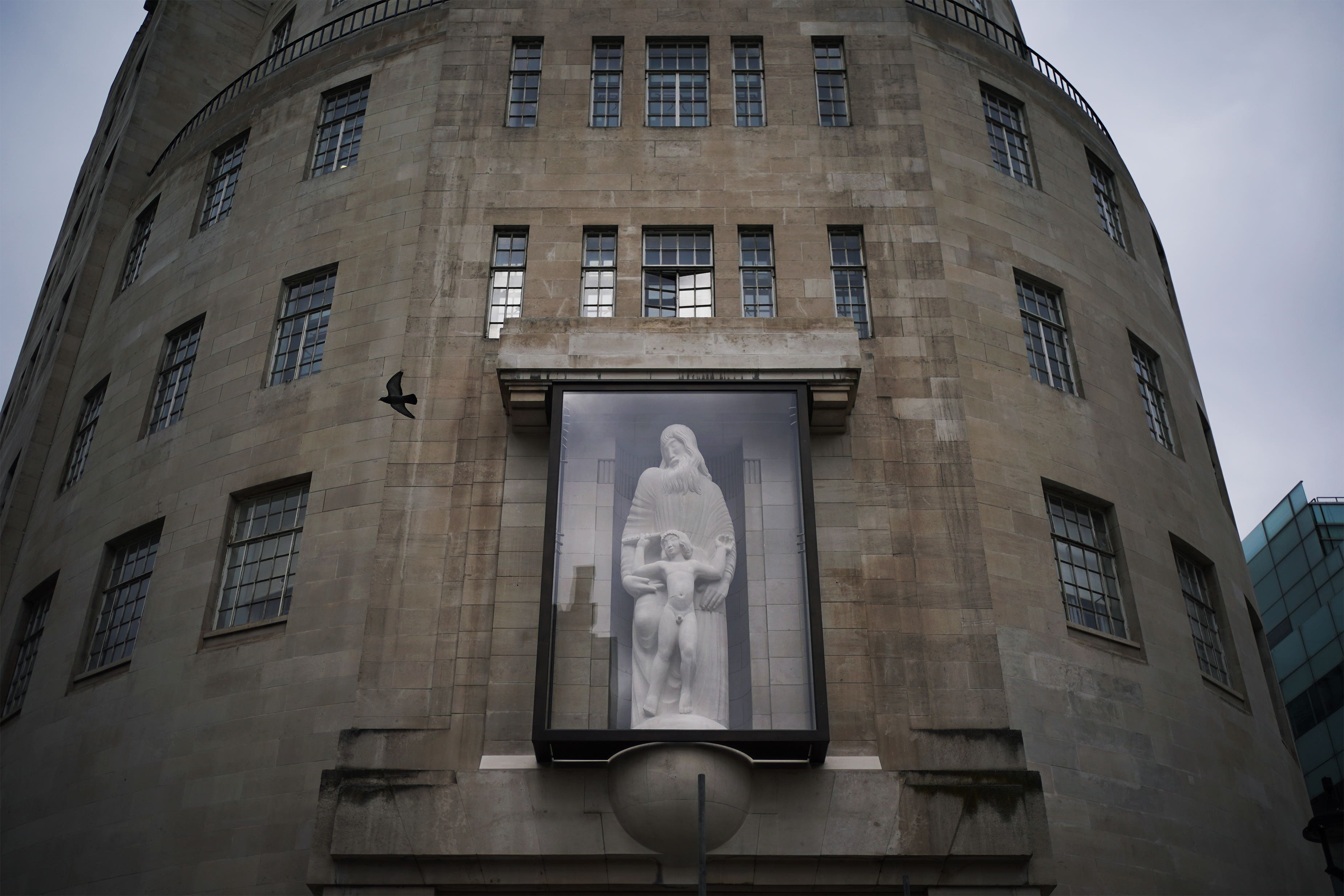 A protective screen in place around the controversial sculpture at Broadcasting House (Yui Mok/PA)