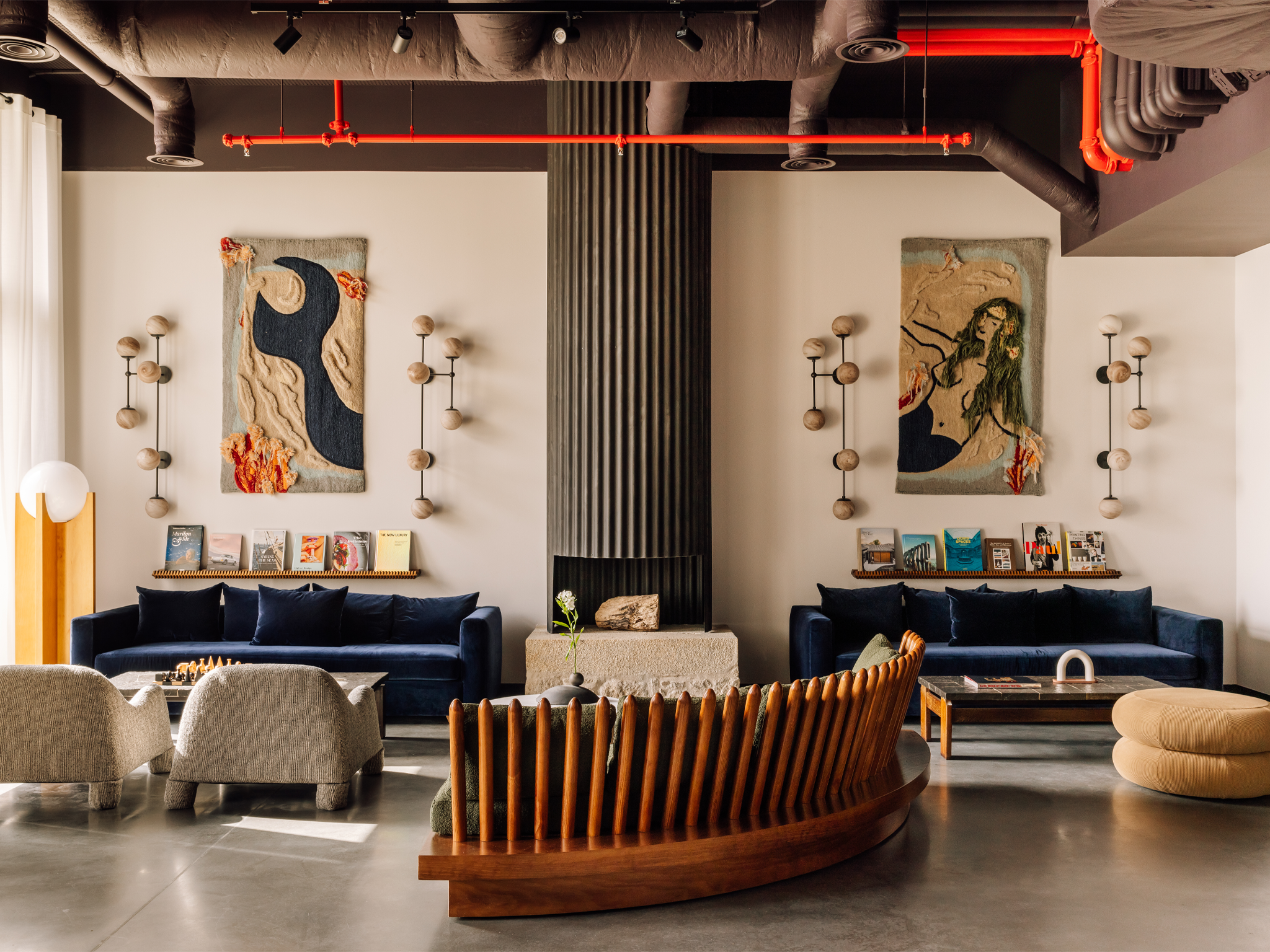 The Rebello’s interiors nod to the building’s industrial past, with contemporary additions