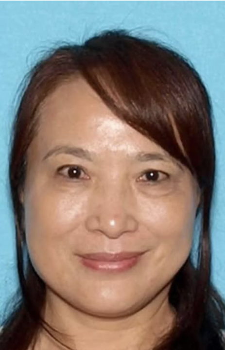 Yafang Zhou died at a local hospital hours after crews pulled her from a storm drain