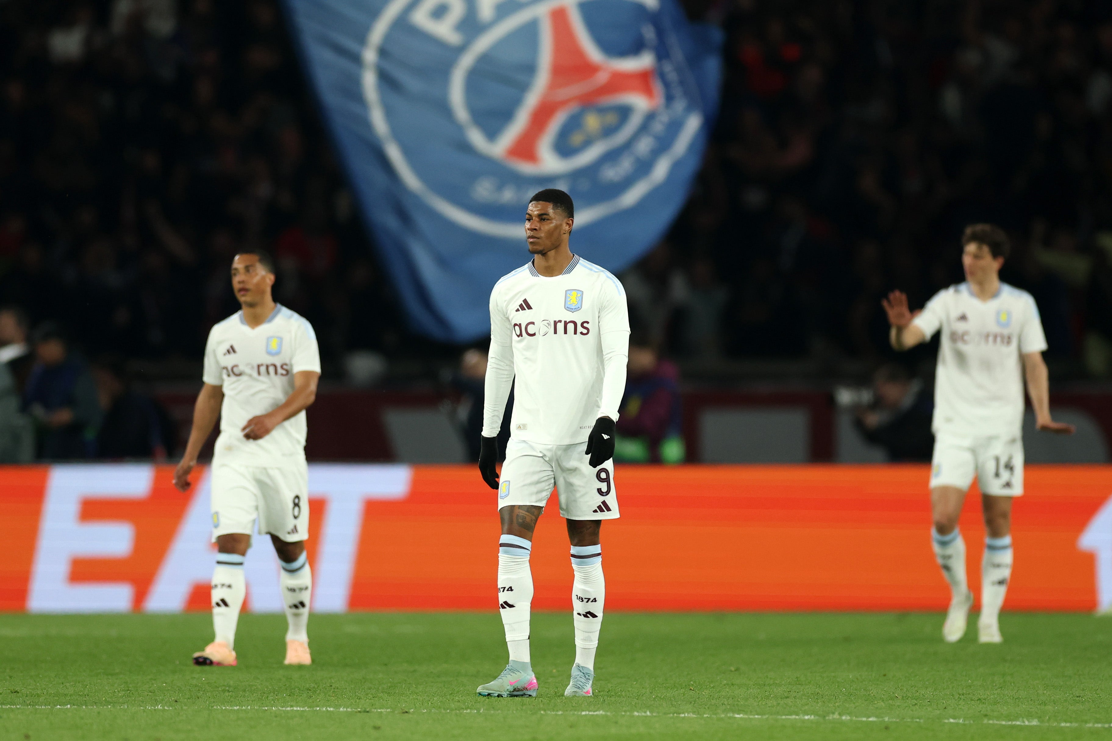 Marcus Rashford of Aston Villa looks dejected after Desire Doue of Paris Saint-Germain (not pictured) scores his team's first goal during the UEFA Champions League 2024/25 Quarter Final First Leg match between Paris Saint-Germain and Aston Villa FC at Parc des Princes on April 09, 2025 in Paris, France