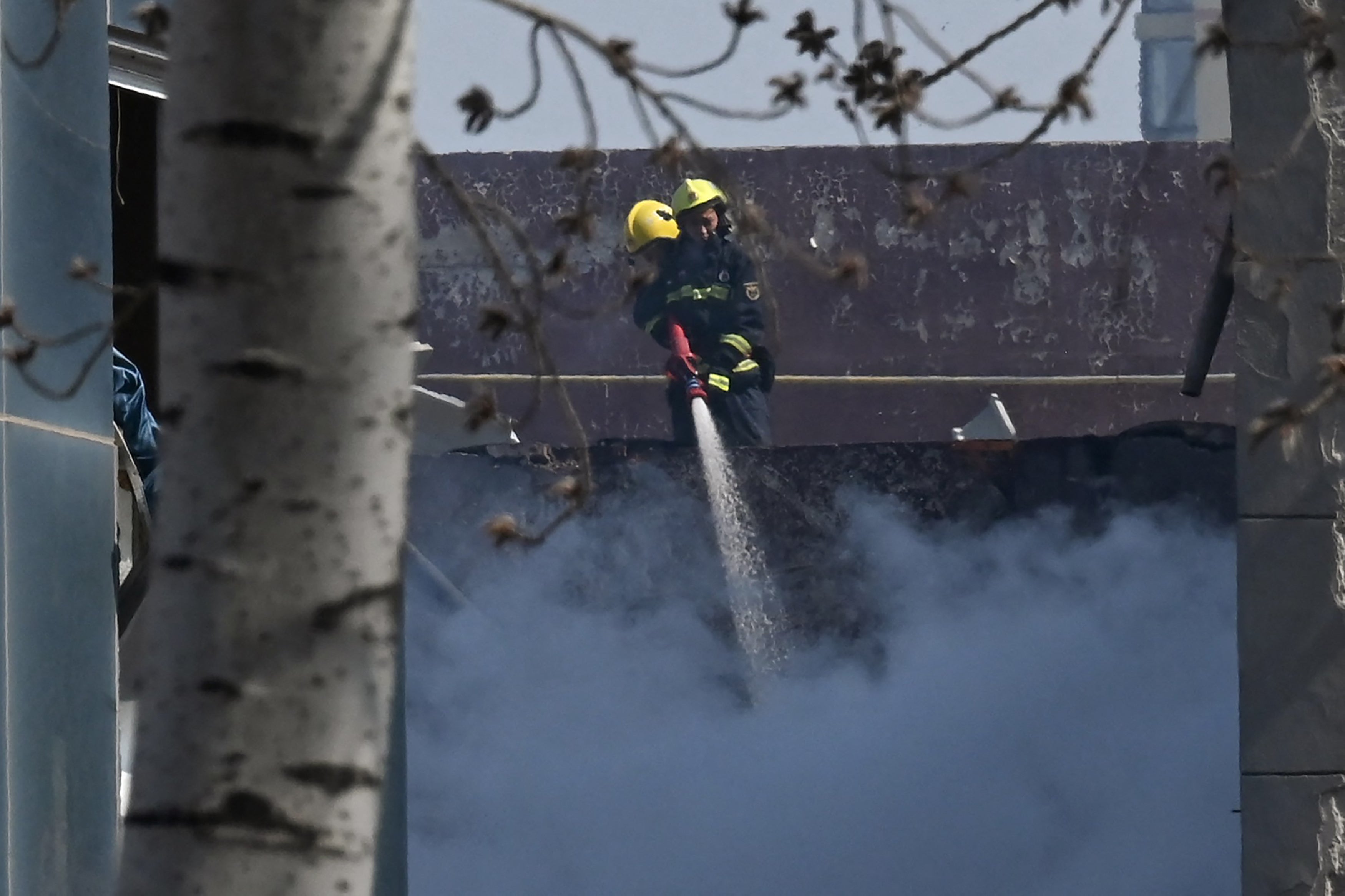 Representational. Firefighters extinguish a fire in China's northern Hebei province