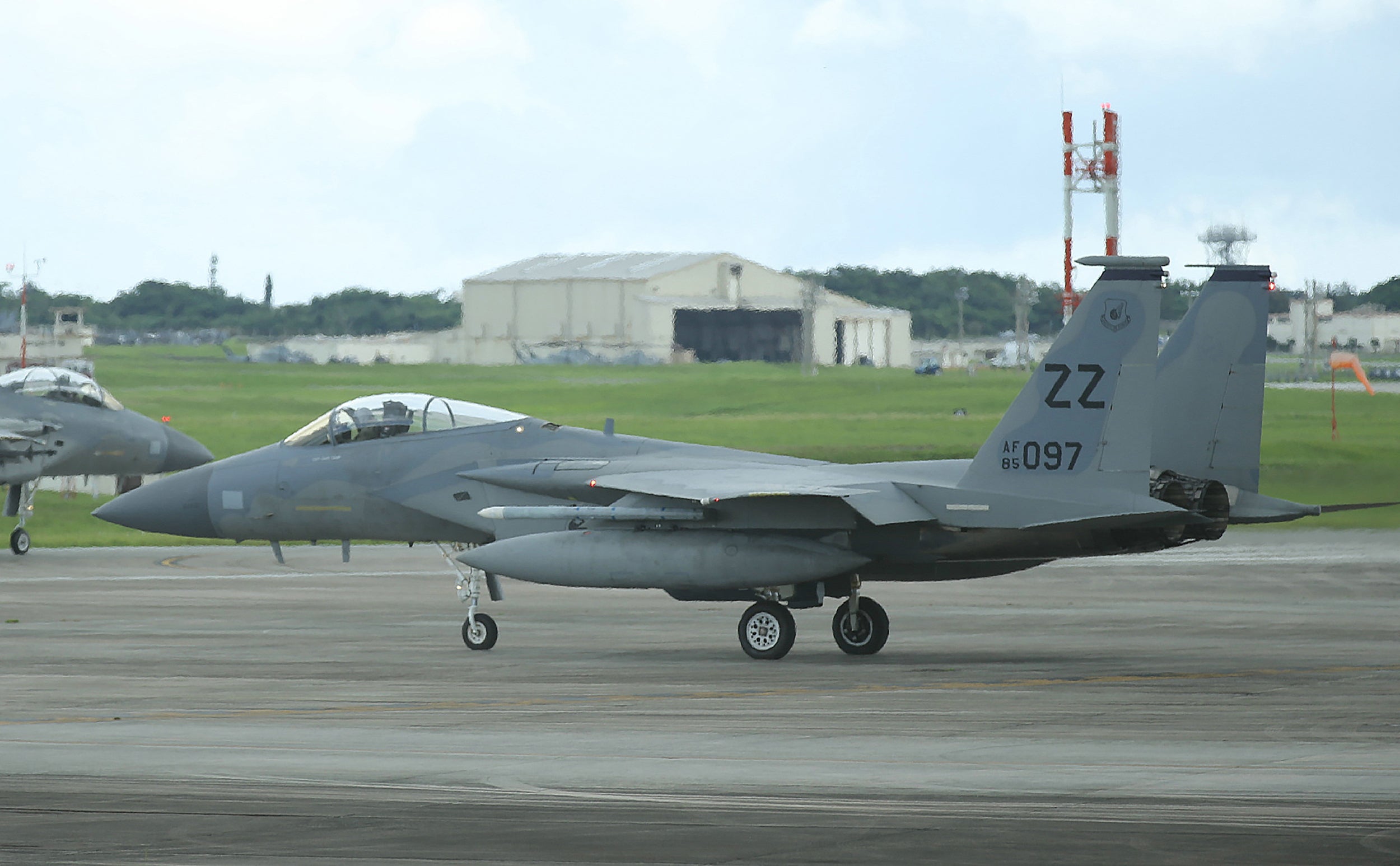 File: A US Air Force F-15 fighter aircraft taxiing at Kadena air force base in Okinawa