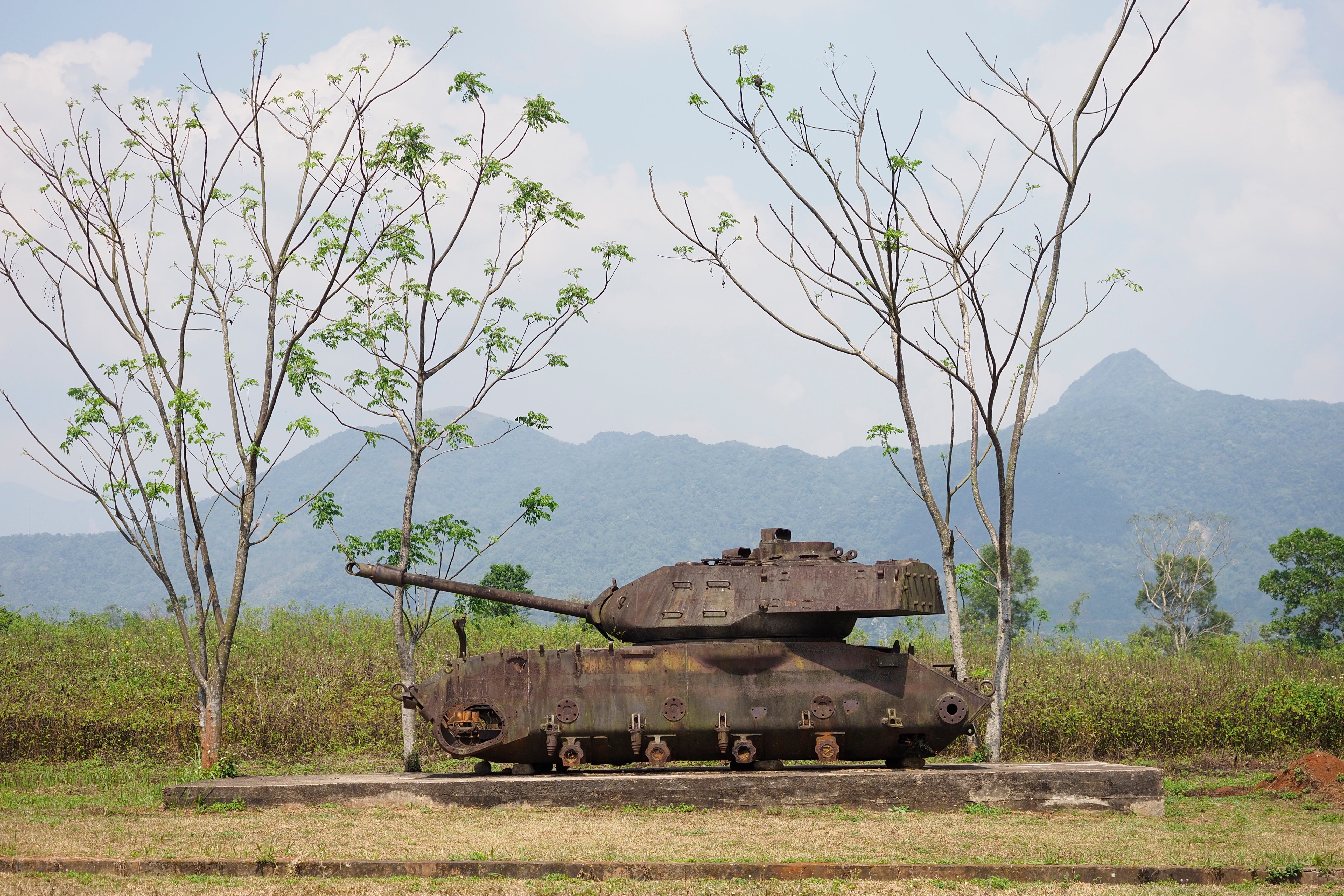 The wreckage of an American tank on display at the former Khe Sanh Combat Base
