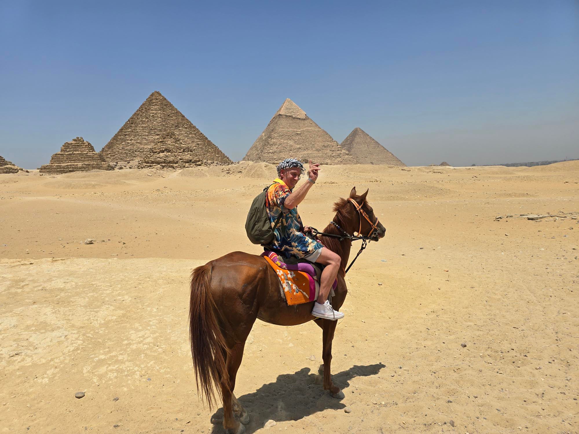 Terry did many bucket list things, including riding a horse around the pyramids