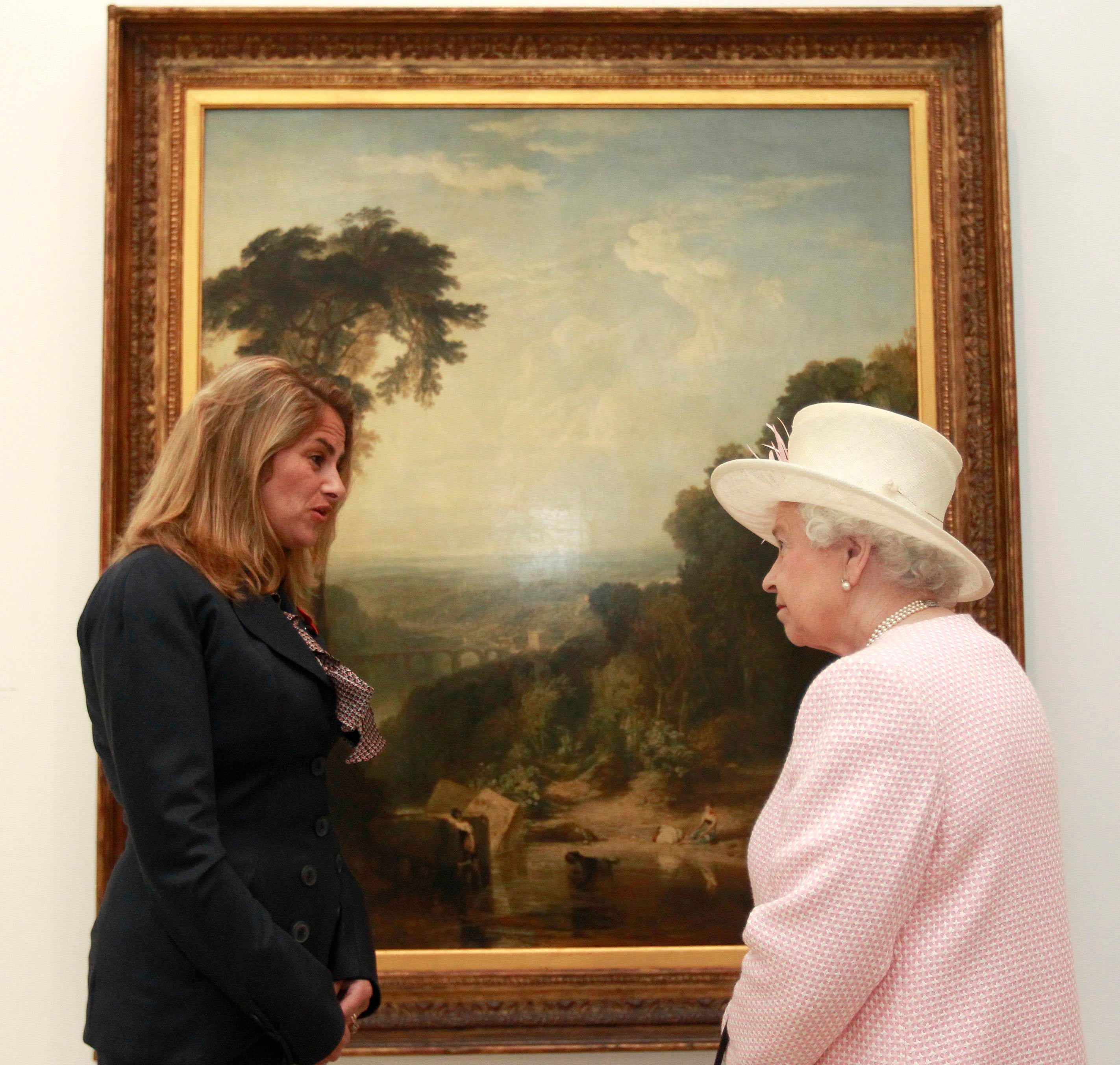 Queen Elizabeth II meets British artist Tracey Emin in front of JMW Turner’s ‘Crossing the Brook’ while visiting the Turner Contemporary Gallery, in 2011