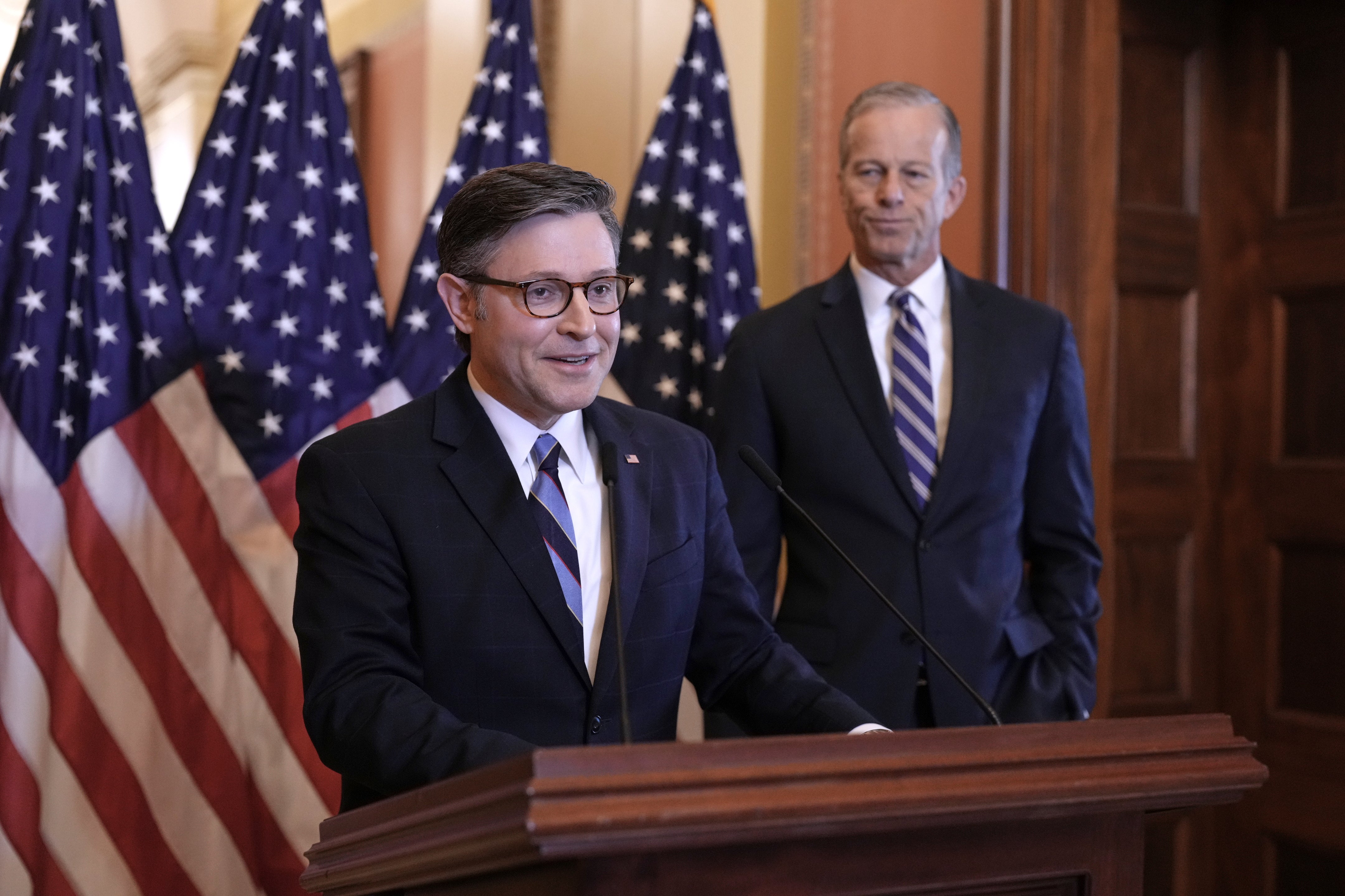Mike Johnson smiles Thursday morning at a press conference with Senate Majority Leader John Thune ahead of the successful passage through the House of a Senate budget resolution
