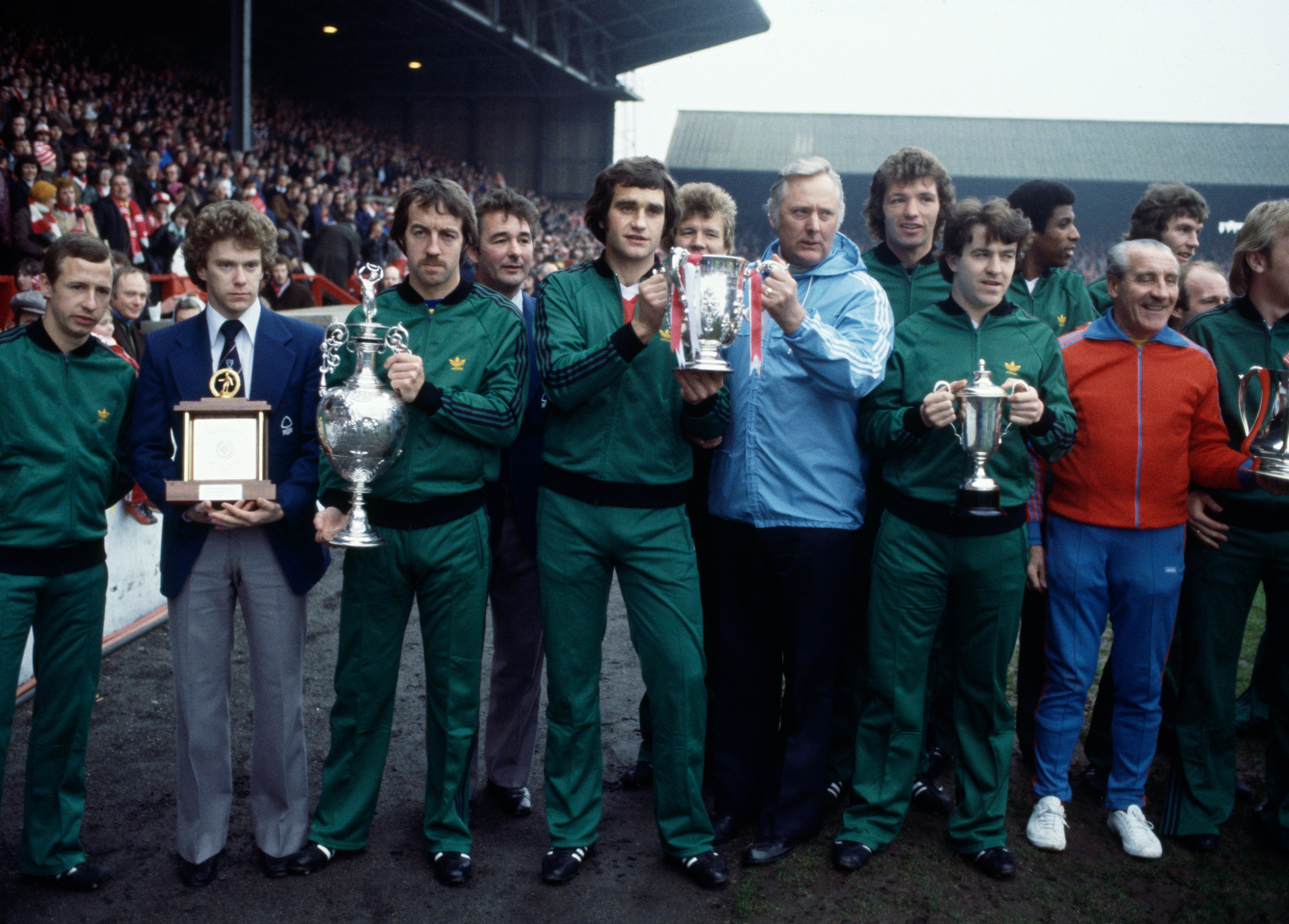 Nottingham Forest players and staff pose with the trophies they won throughout the season, circa May 1978