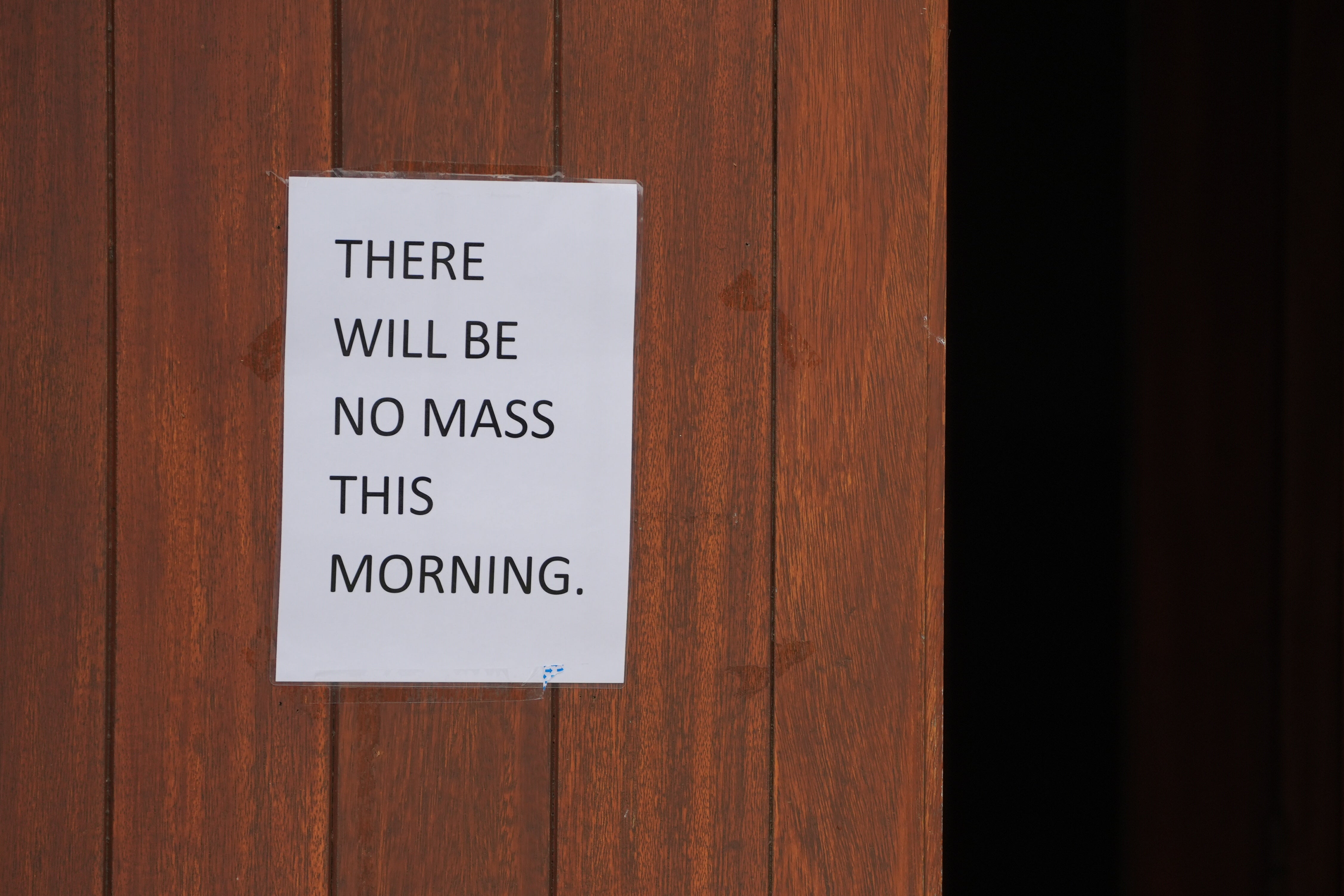 A sign on the door at St Patrick’s Garrison Church at Renmore Barracks after the attack (Brian Lawless/PA)