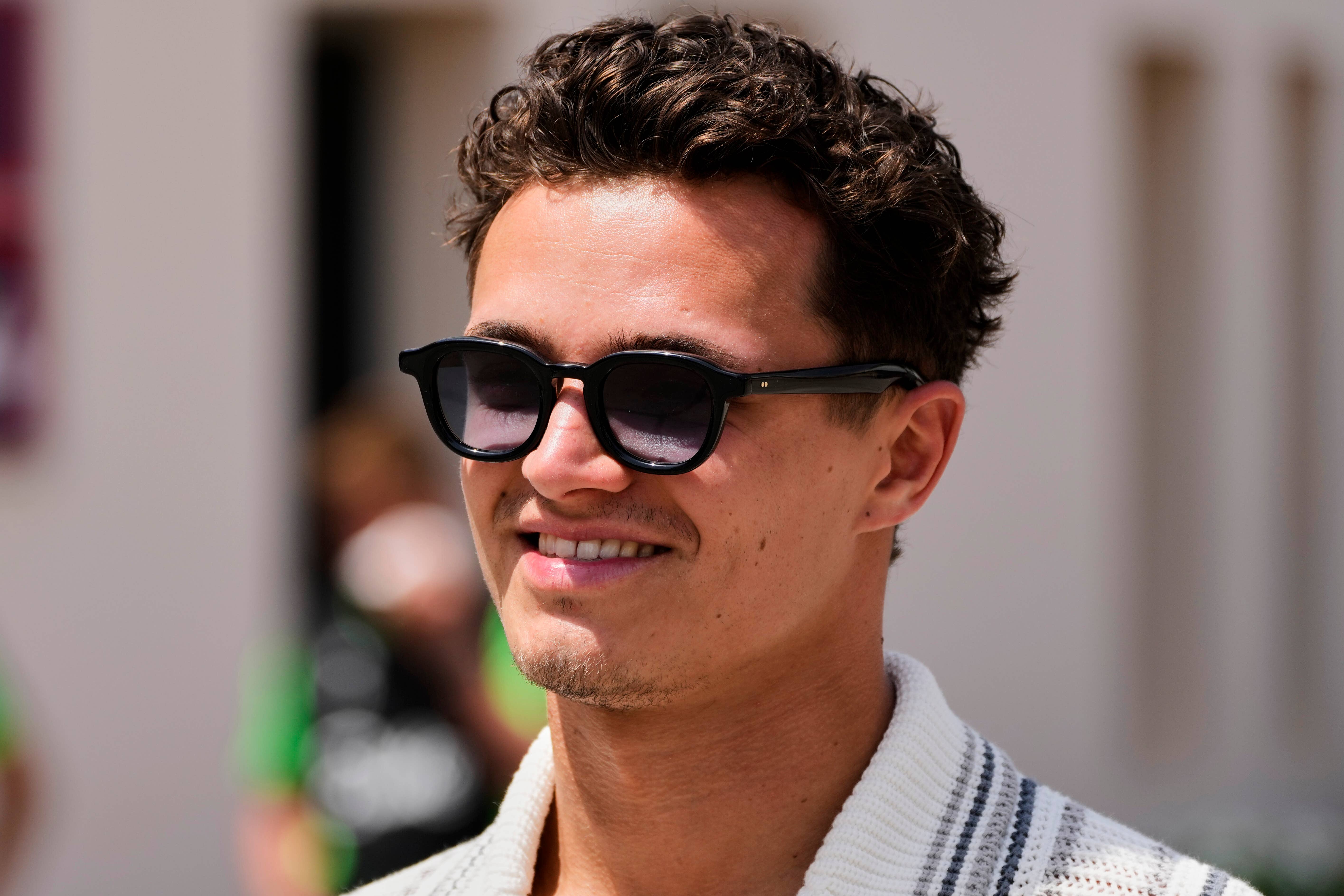Lando Norris says more risk may be needed at times to win races (Darko Bandic/AP)