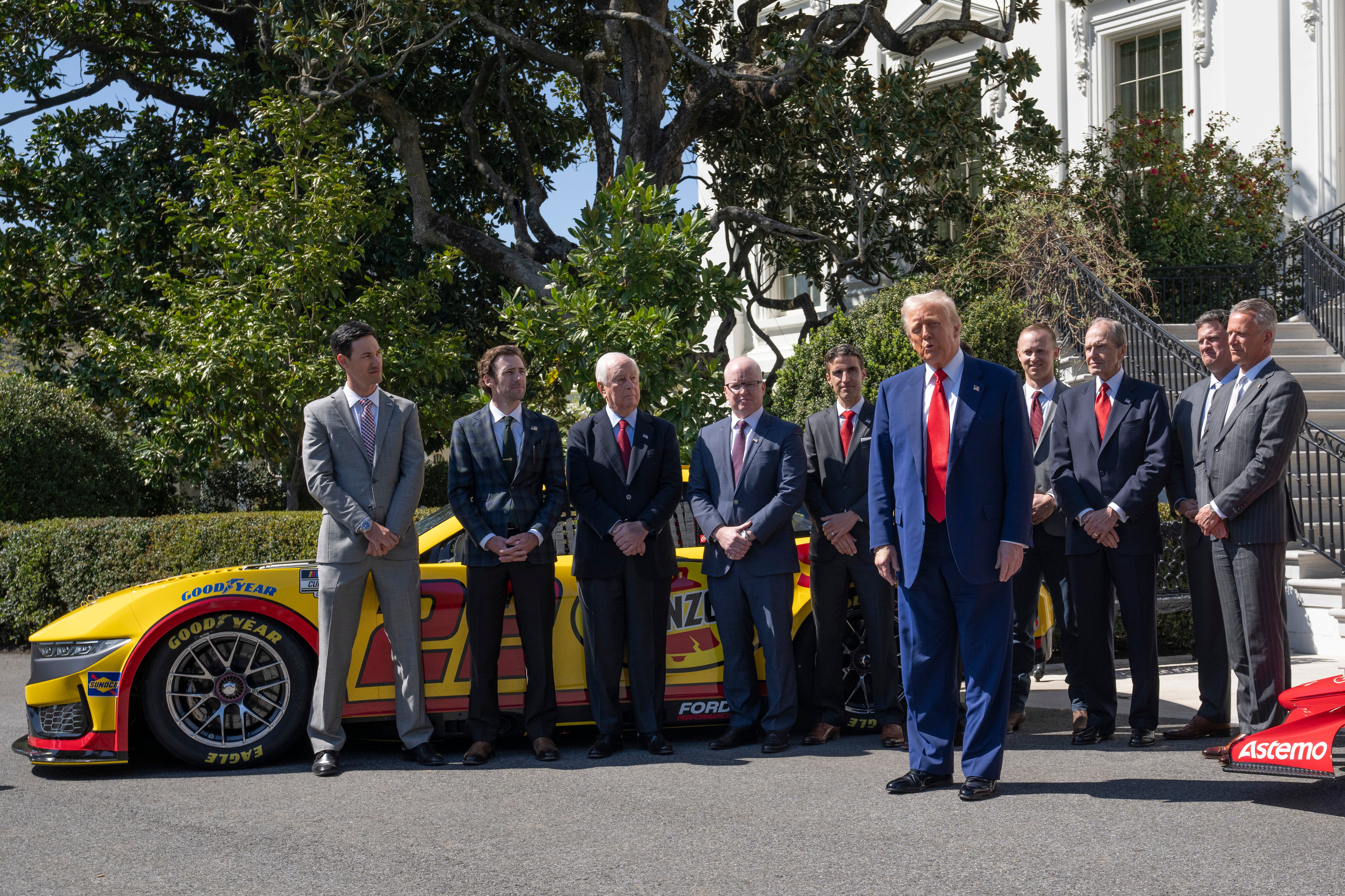 Trump pictured outside the White House after announcing his tariff pause