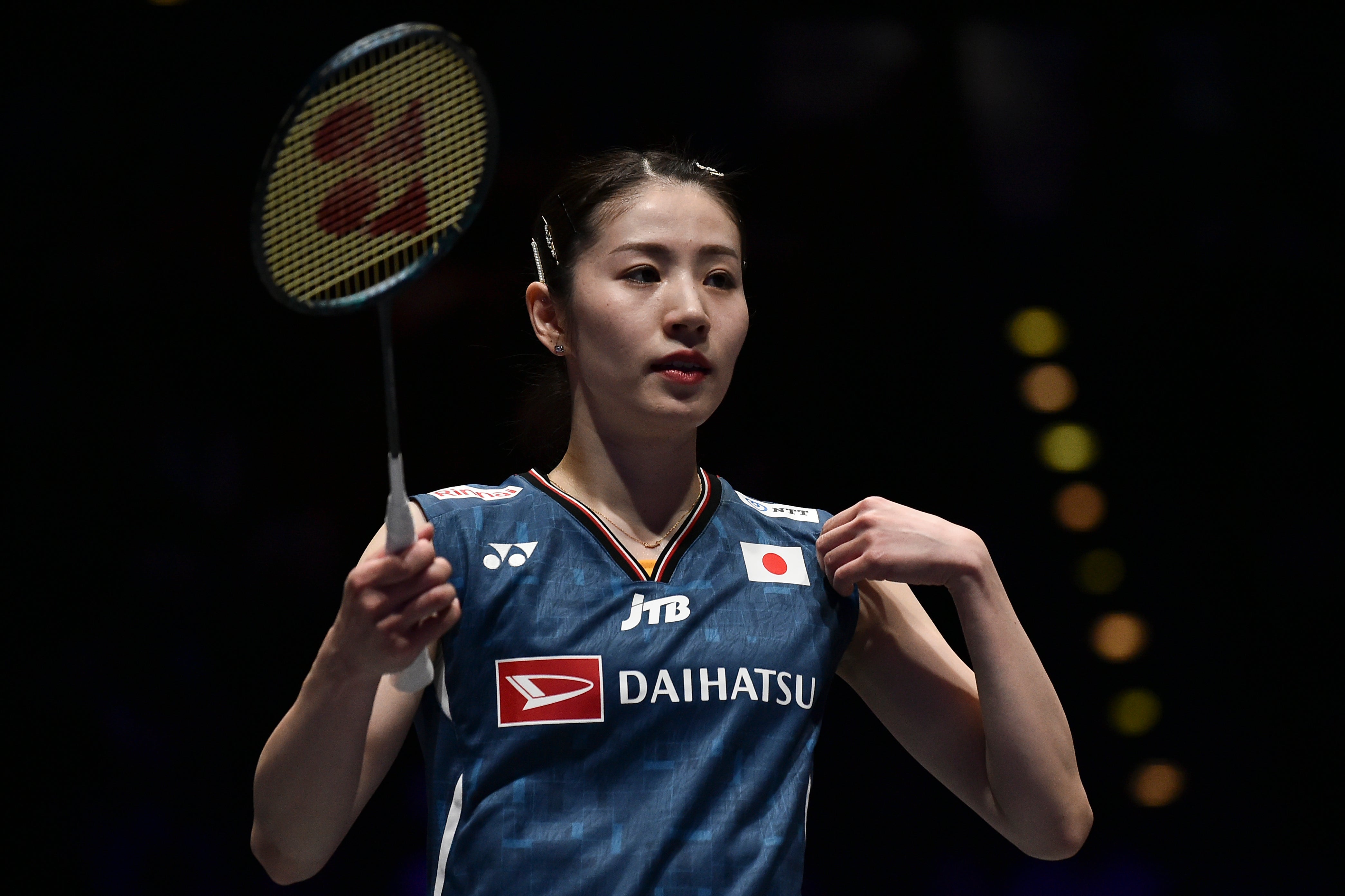 Chiharu Shida of Japan against Liu Sheng Shu and TanNing of China during their women's doubles badminton semi final match at the All England Open Badminton Championships