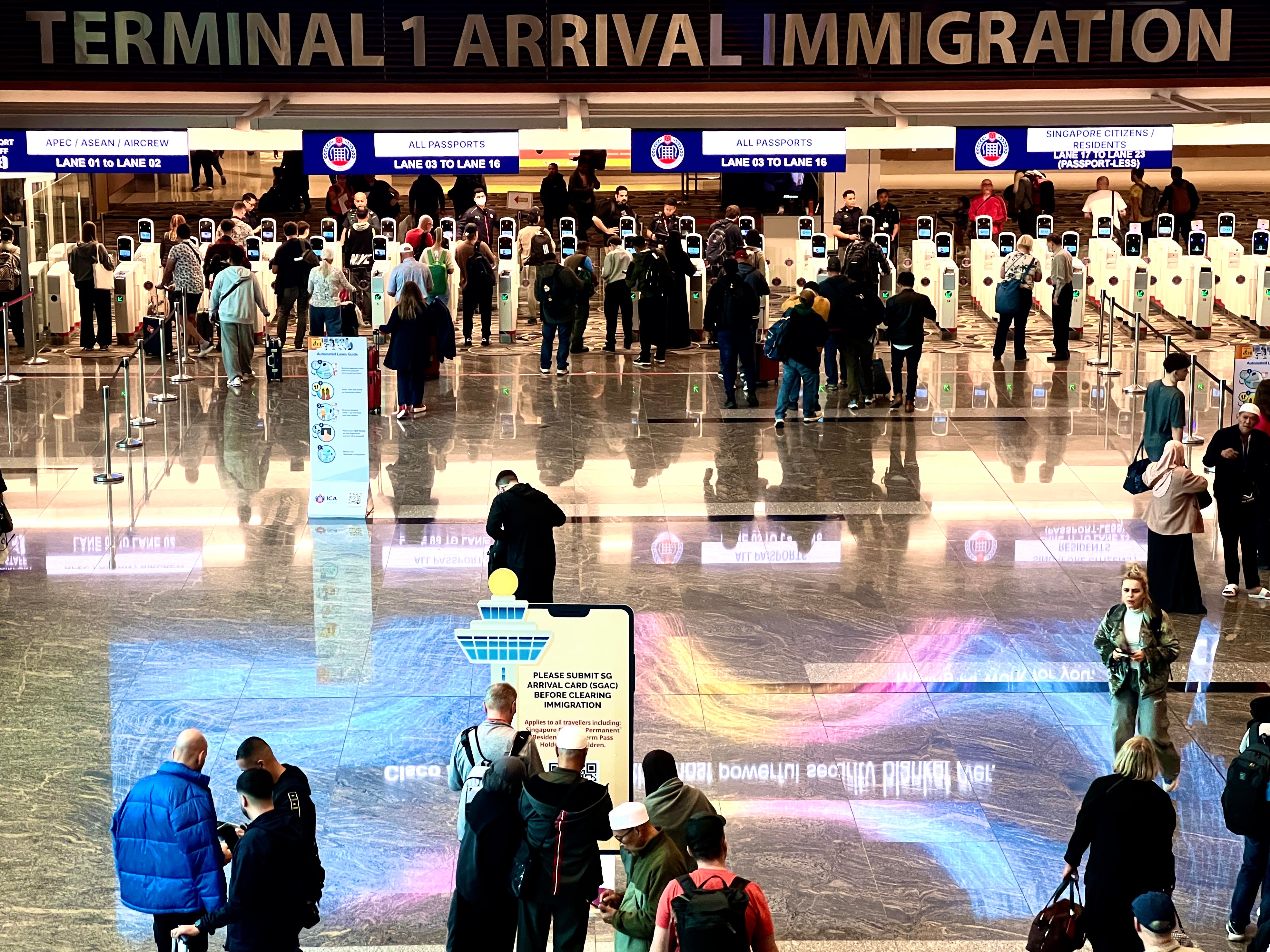 Digital checkpoint: Singapore airport has kiosks to clear travellers through passport control