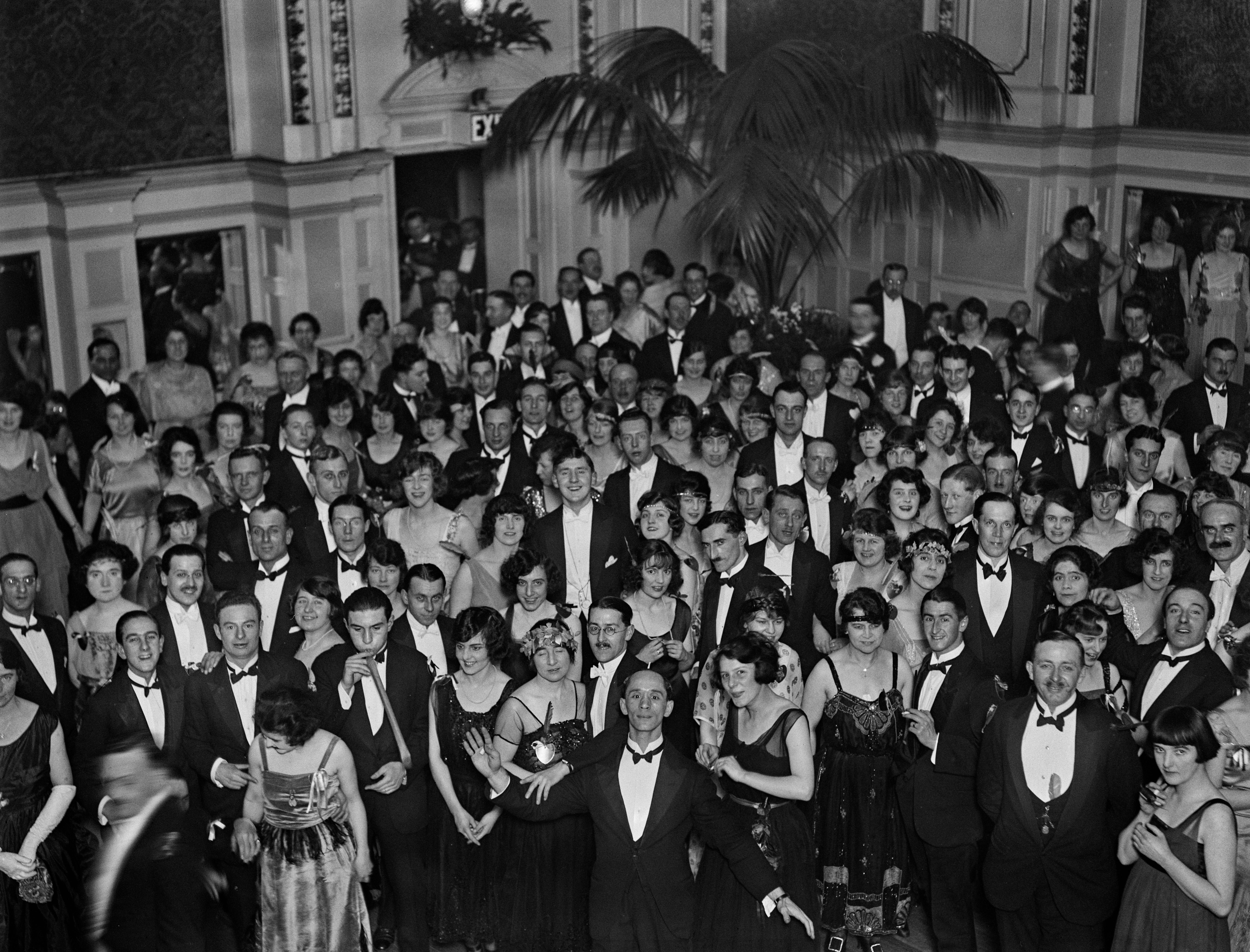 Patrons at a St. Valentine's dance and ballroom dancing competition in the Empress Rooms at the Royal Palace Hotel, Kensington, London, 14th February 1921. In the foreground (centre) is South African ballroom dancing teacher Santos Casani (aka John Golman). (Photo by Morey/Topical Press Agency/Hulton Archive/Getty Images)