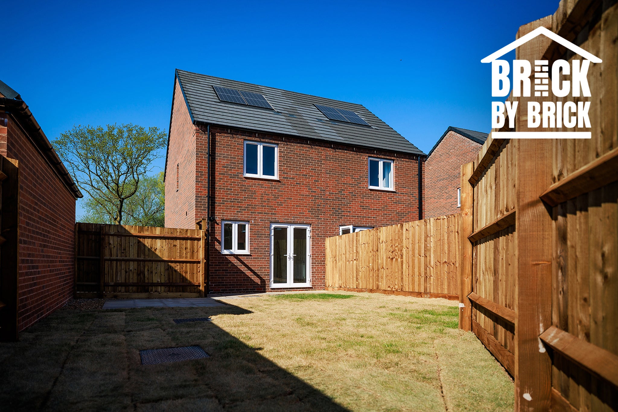 The first family fleeing domestic abuse has moved into a house built by The Independent’s campaign