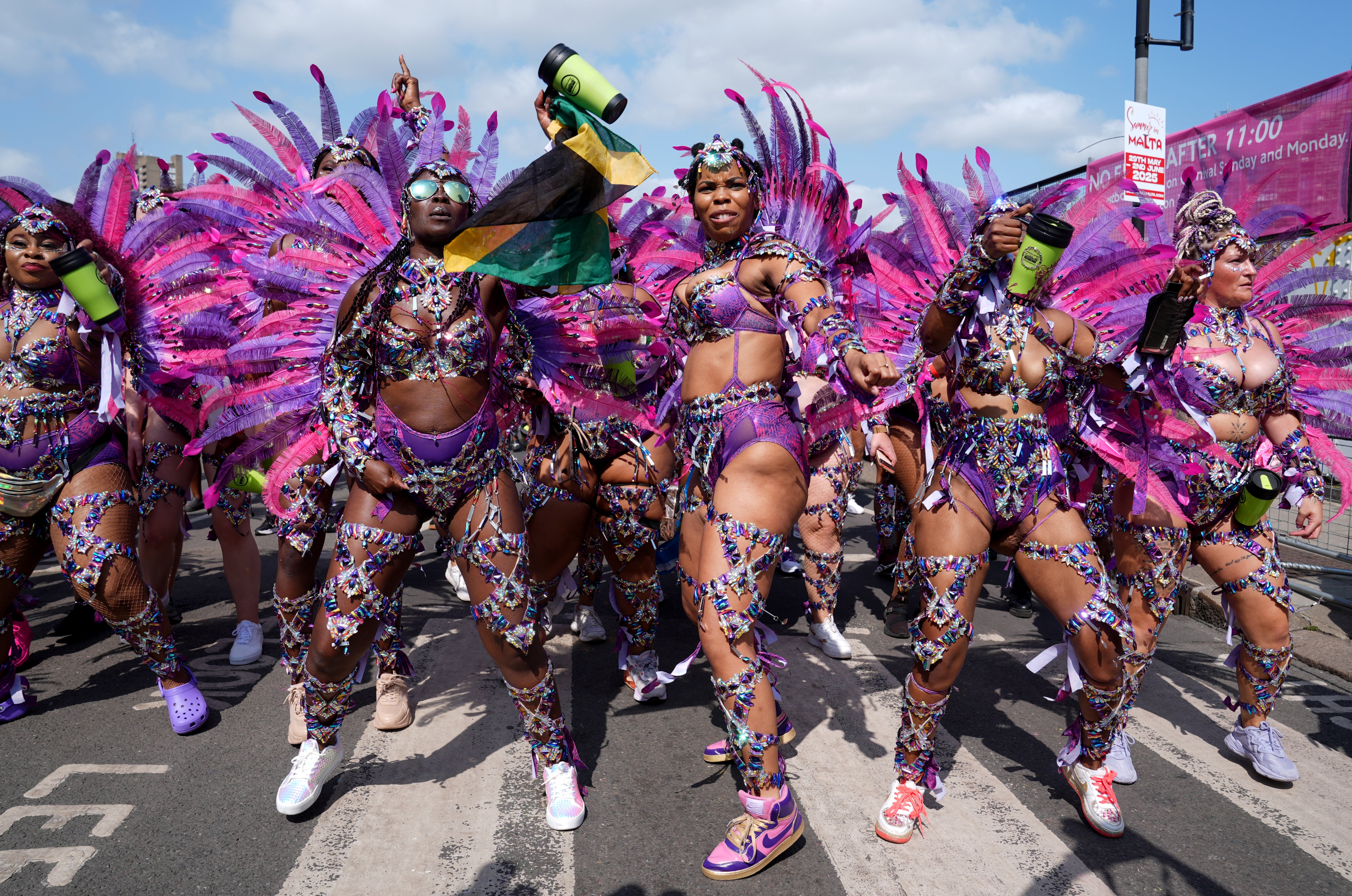 Dancers prepare to take part in 2024’s Notting Hill Carnival (Lucy North/PA)