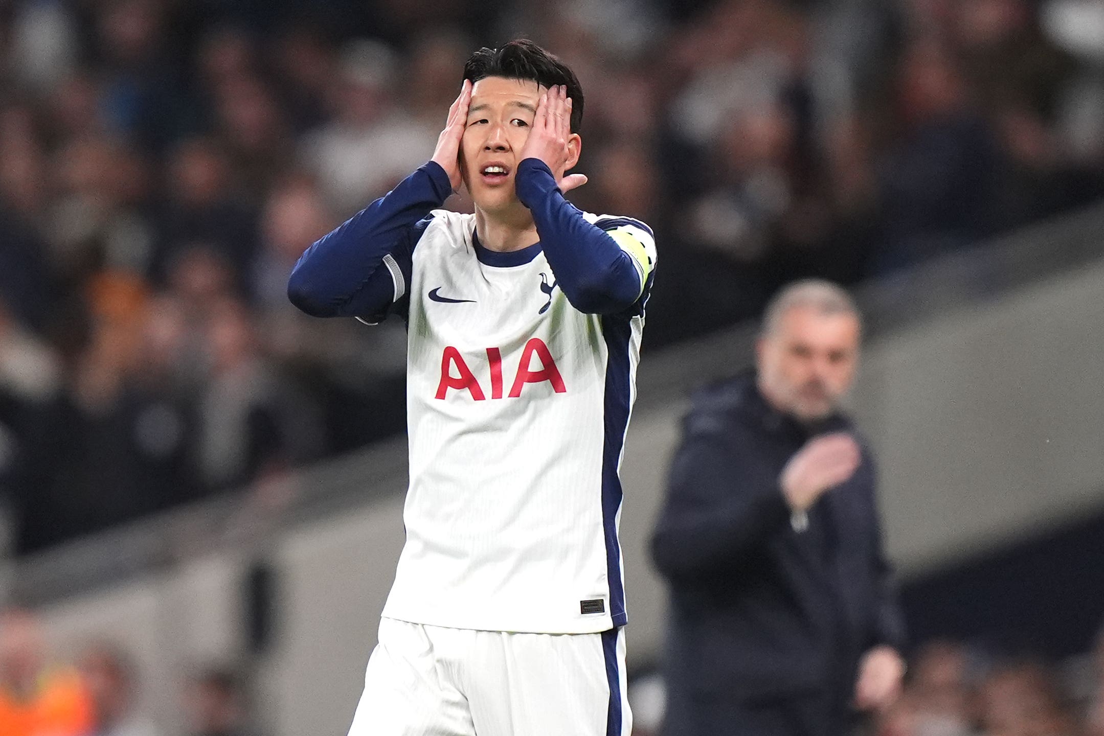 Son Heung-min reacts during Tottenham’s 1-1 draw with Eintracht Frankfurt (Bradley Collyer/PA)