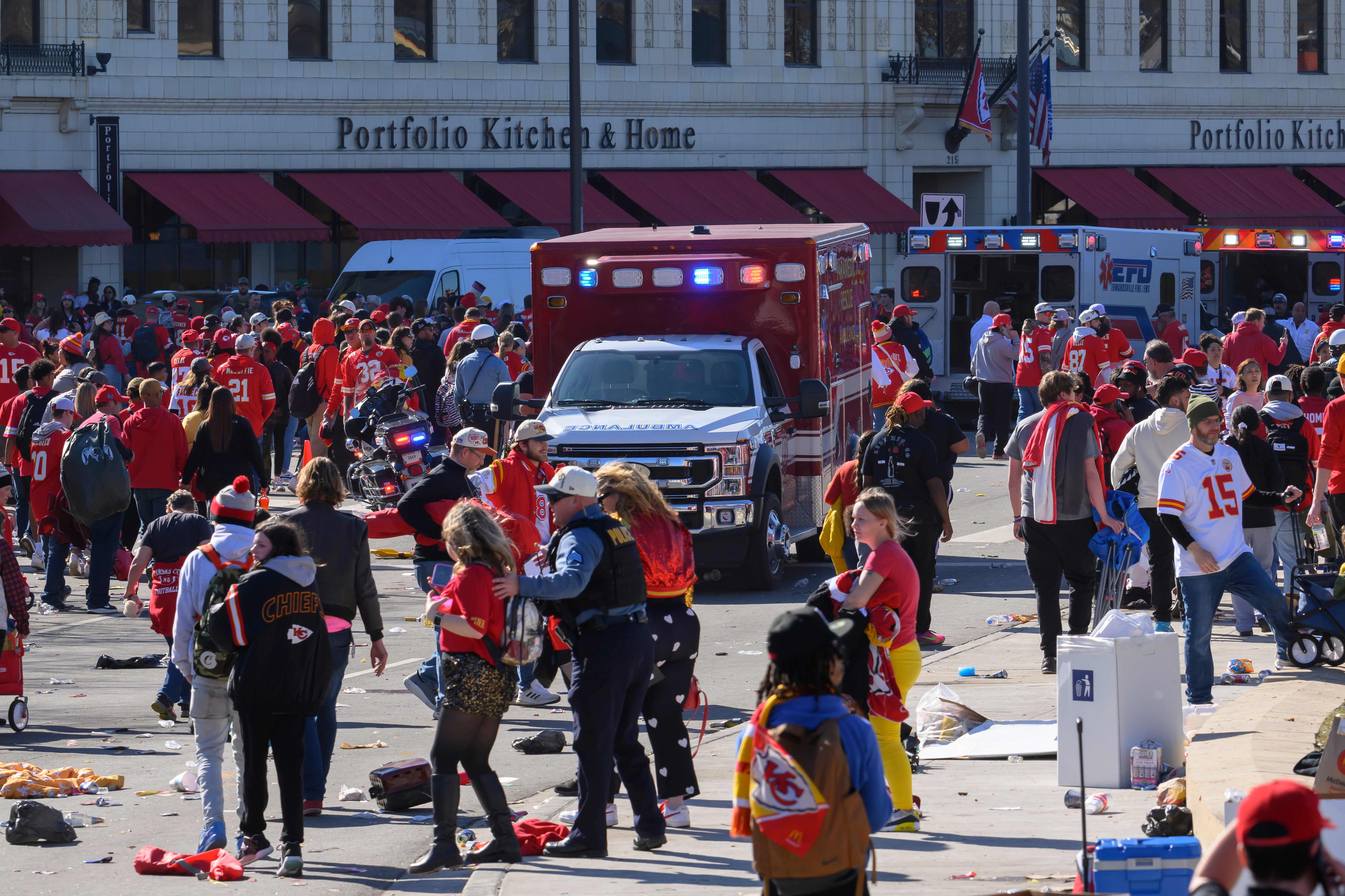 Police clear the area following a shooting at the Kansas City Chiefs NFL football Super Bowl celebration