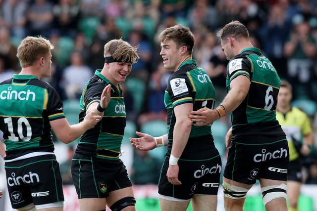 <p>Tommy Freeman (second from right) was one of a number of Lions contenders to sparkle for Saints in a big win over Castres</p>