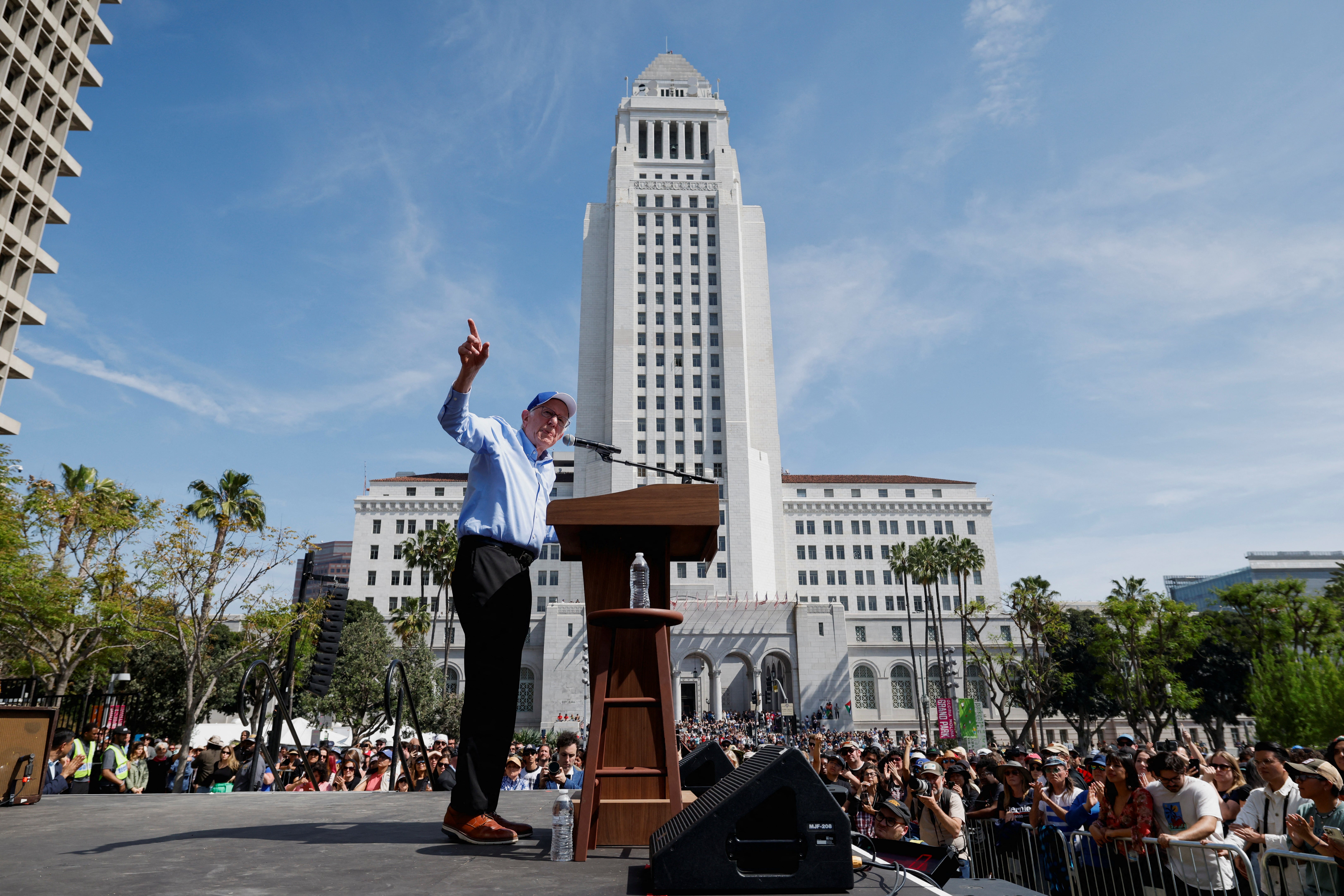 Senator Bernie Sanders (I-VT) gestures as he speaks during a rally held along with Representative Alexandria Ocasio-Cortez (D-NY), in Los Angeles, California