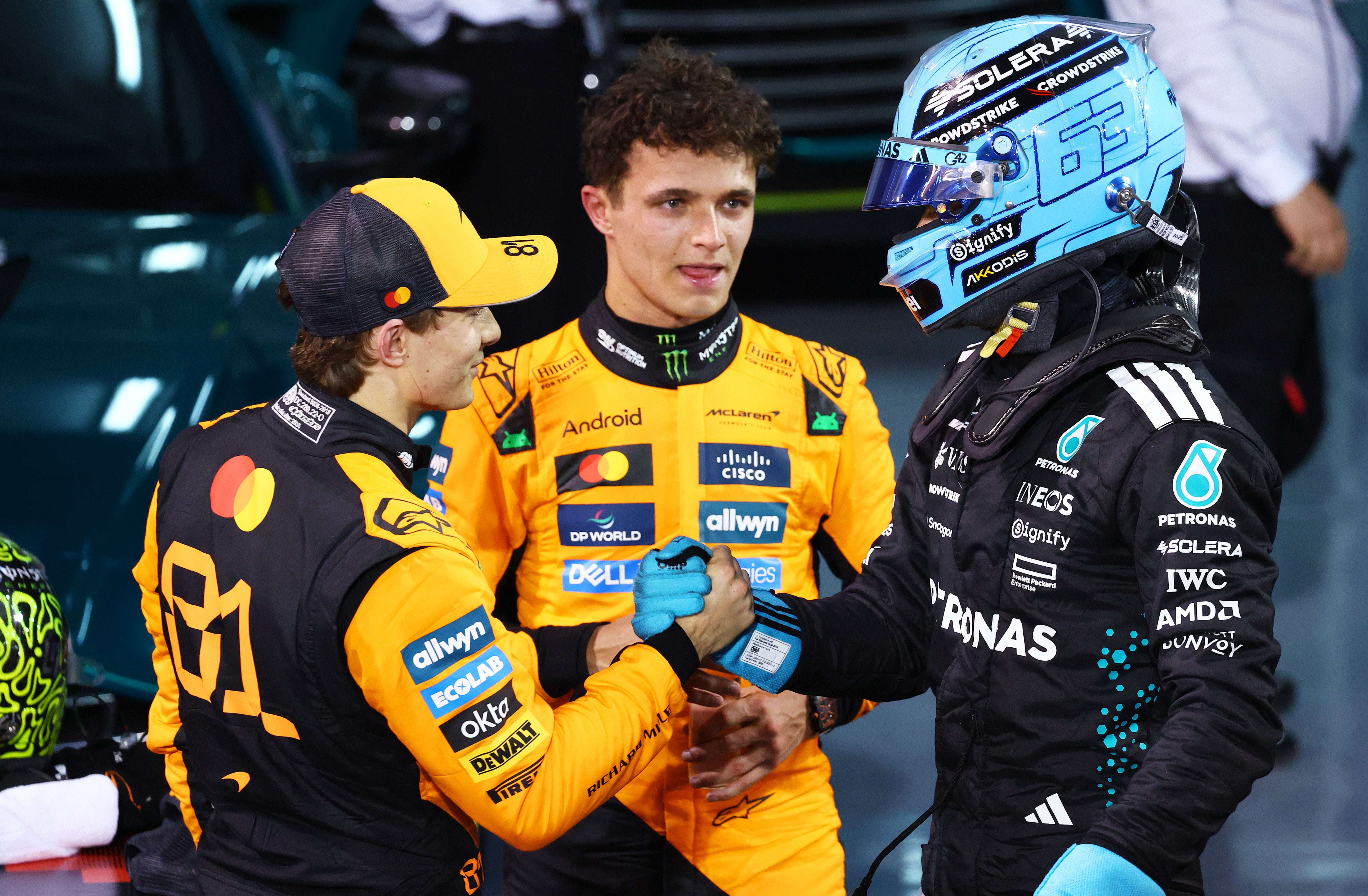 Lando Norris (centre) leads the F1 world championship after four rounds