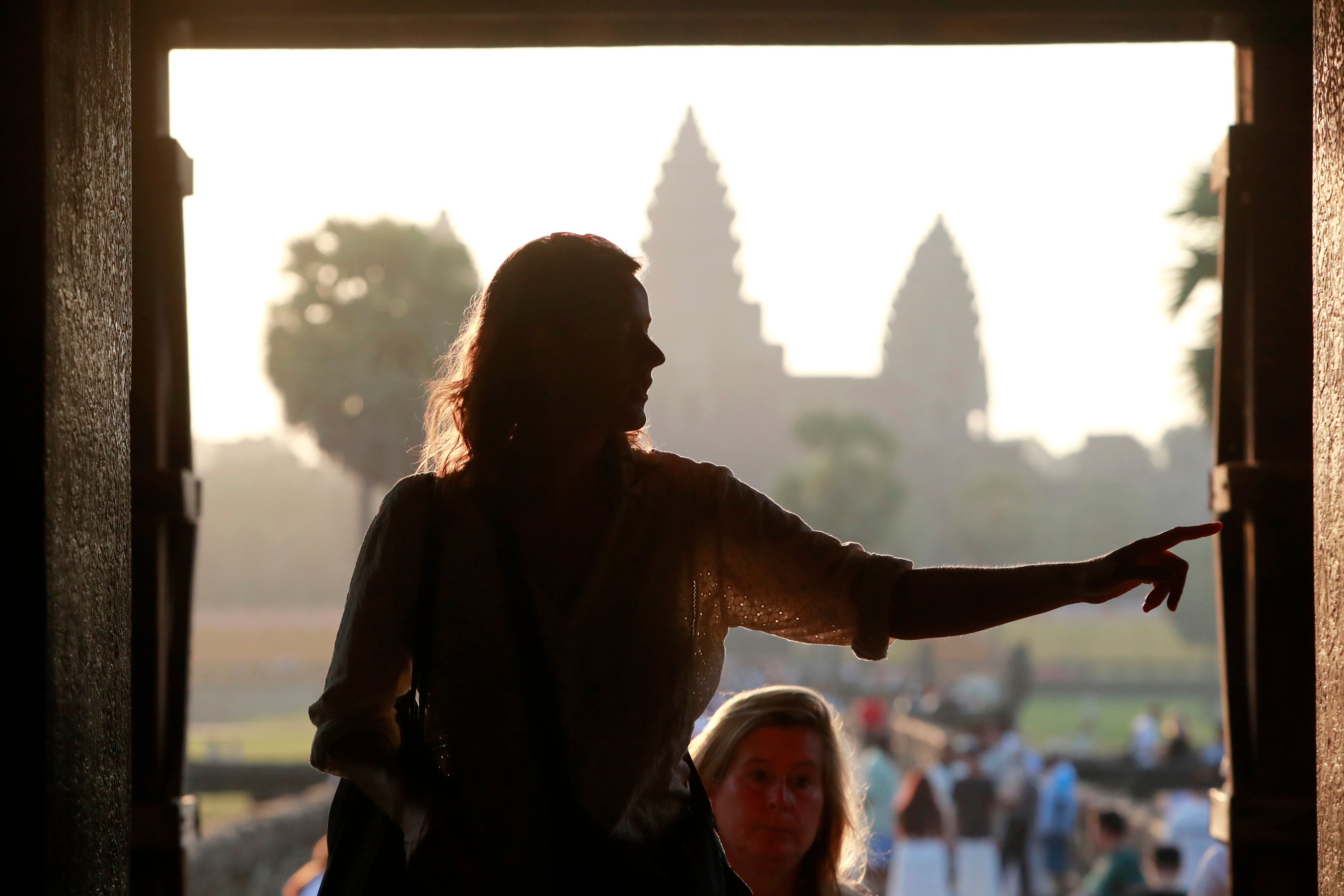 Tourists visit the Angkor Wat temple in Siem Reap province, Cambodia, 13 April 2025