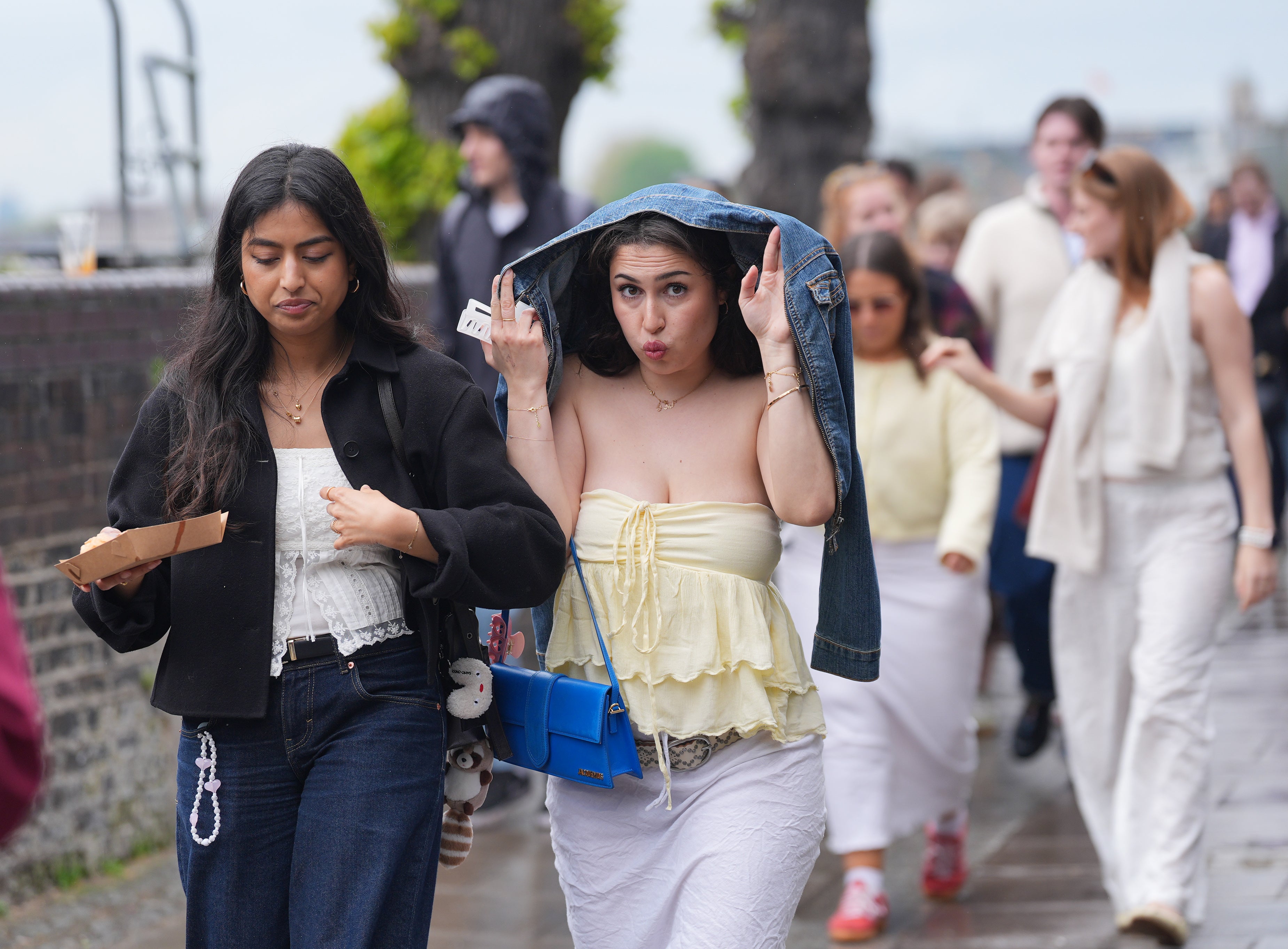 As rain began to fall across the UK on Sunday, the Met Office said showers could continue into the evening
