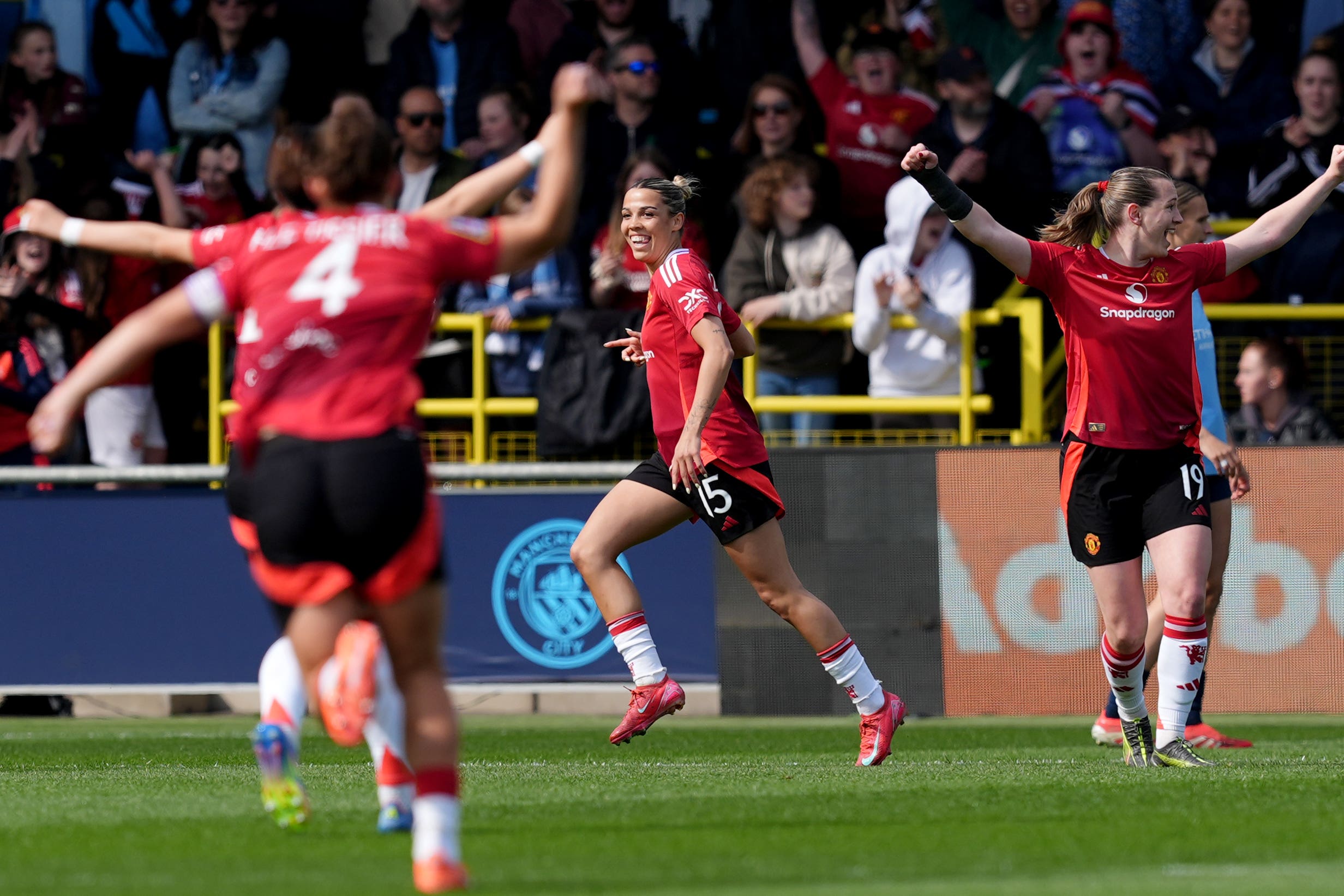 Celin Bizet celebrates her opener against Manchester City