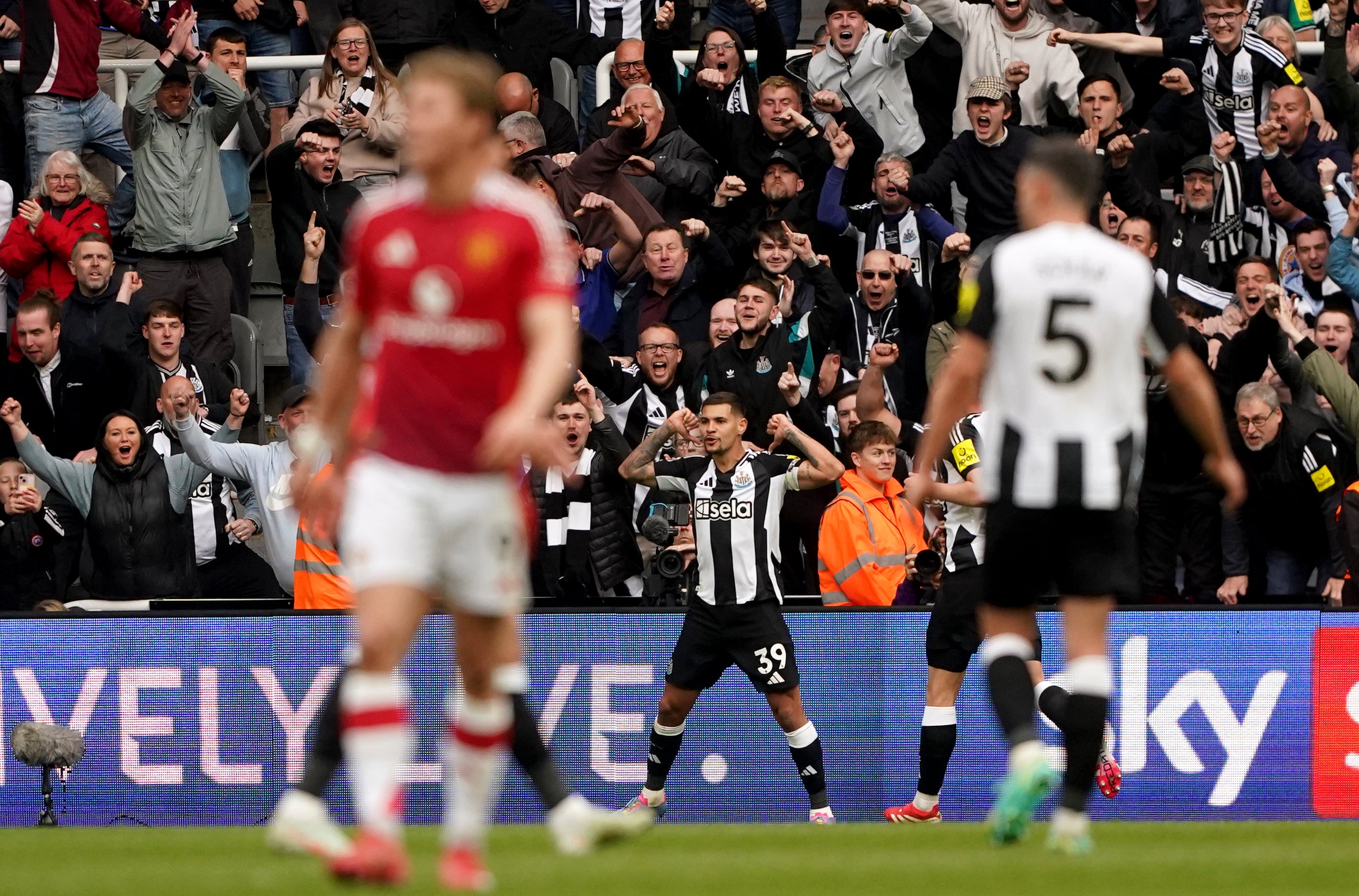 Bruno Guimaraes (centre) netted Newcastle’s fourth goal (Owen Humphreys/PA)