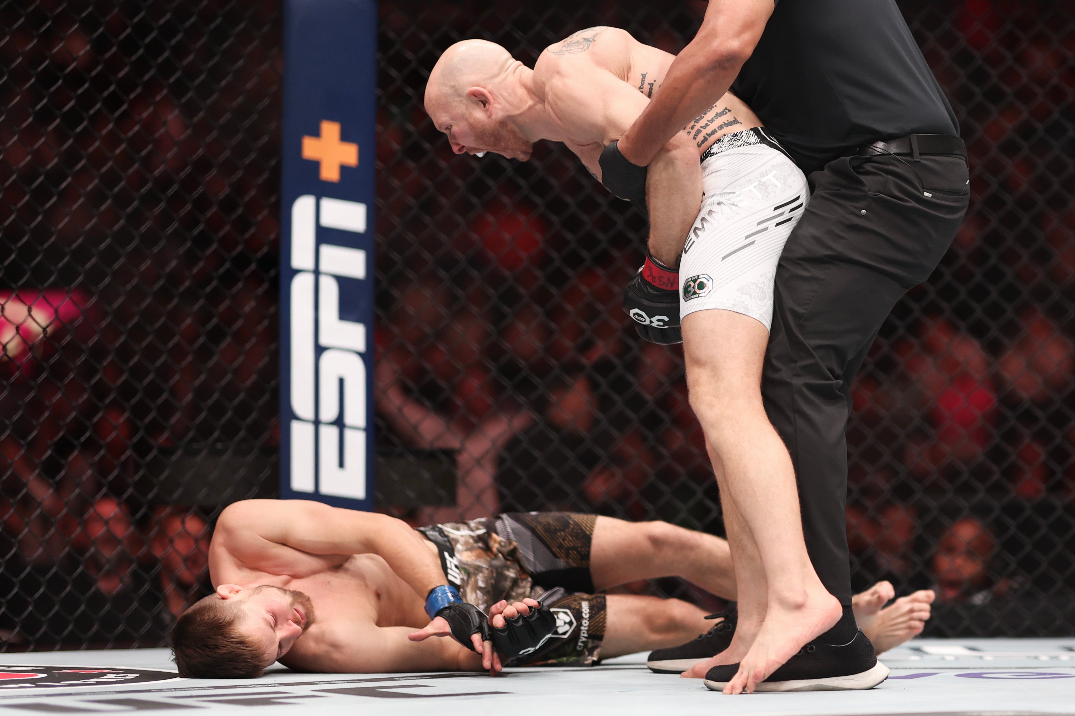 Josh Emmett (right) celebrates his 2023 knockout of Bryce Mitchell