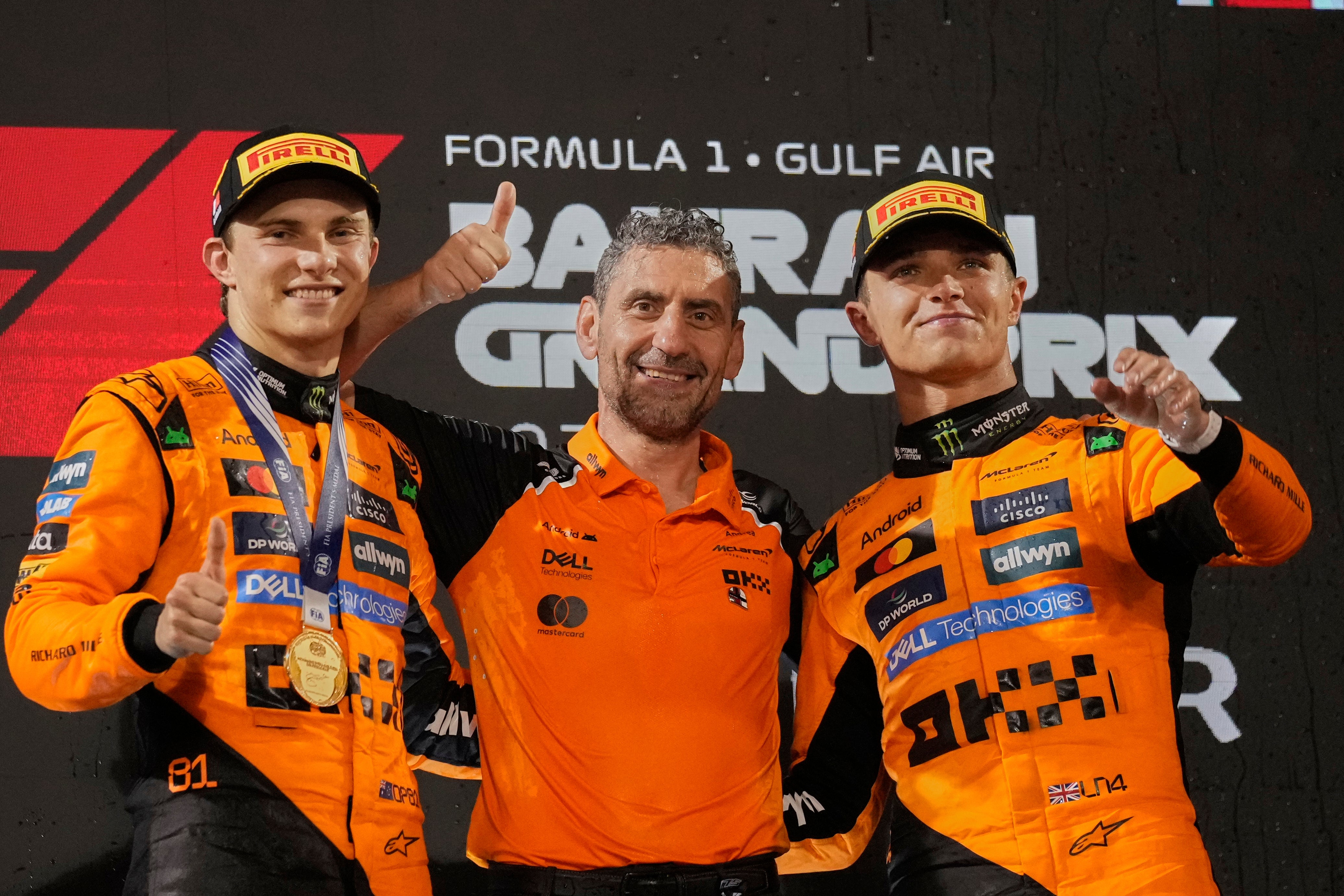 Oscar Piastri took the victory with Norris (right) finishing third