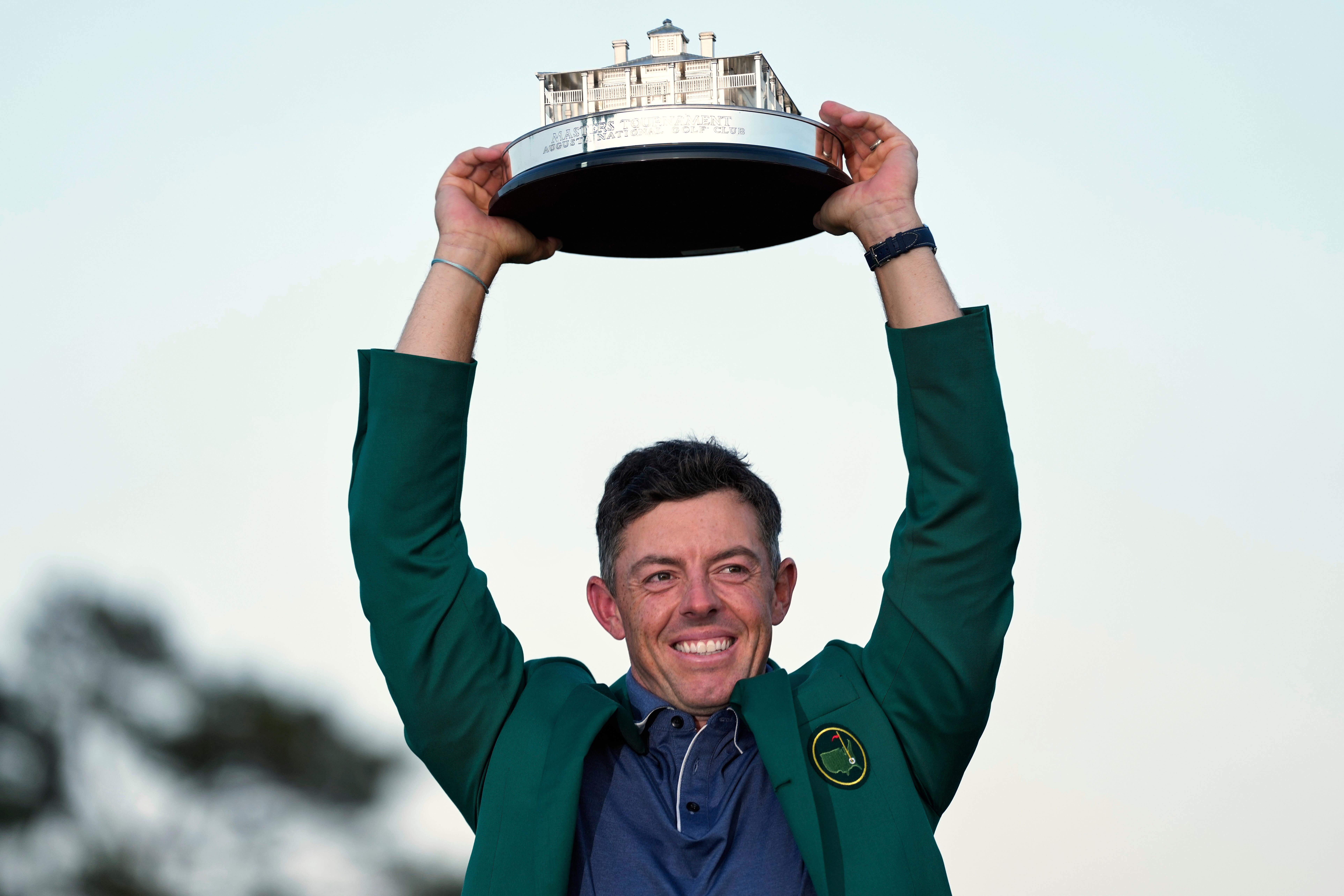 McIlroy holds the Masters trophy, 3,898 days since his last major title