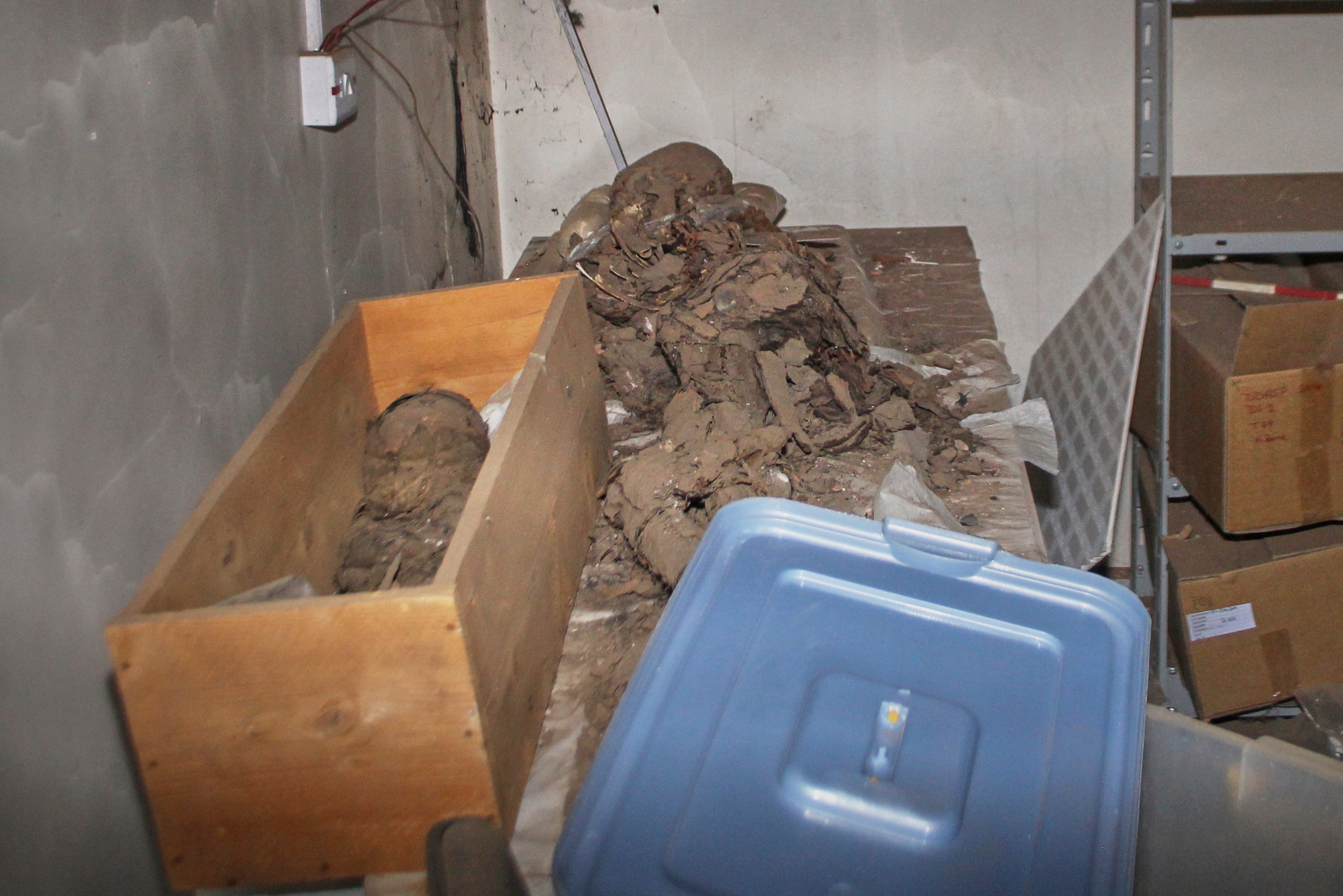 Sudan Looted Mummy coffins lie destroyed on the ground at the Sudan National Museum, the home to the country's largest artifacts that date to different eras of Sudanese history, after nearly two years of war between the army and paramilitary Rapid Support Forces (RSF), in Khartoum, Sudan, Thursday, April 3, 2025. (AP Photo/Khaled Abd Al Gader)