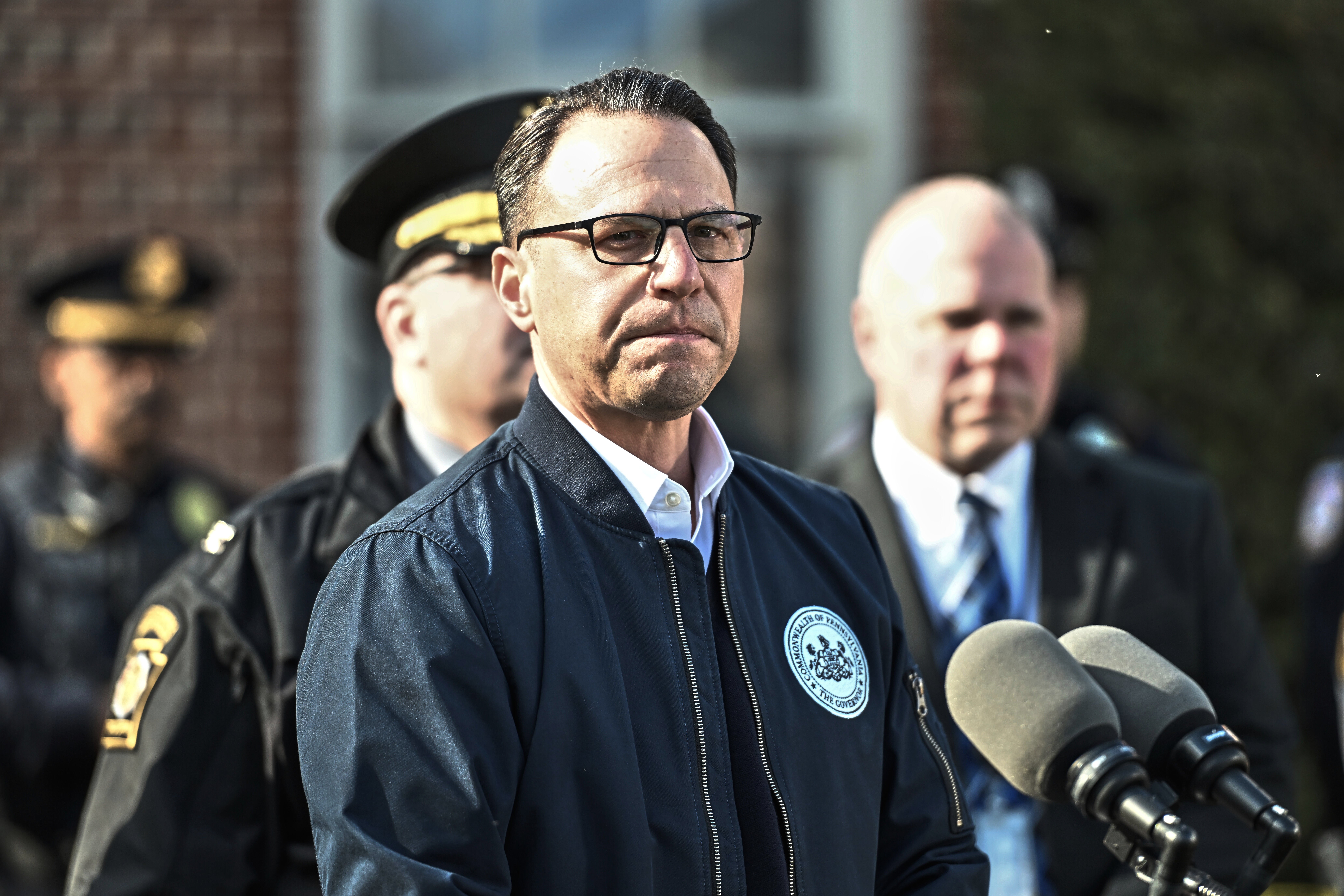 Shapiro pauses during a news conference at the governor’s official residence discussing the alleged arson on Sunday
