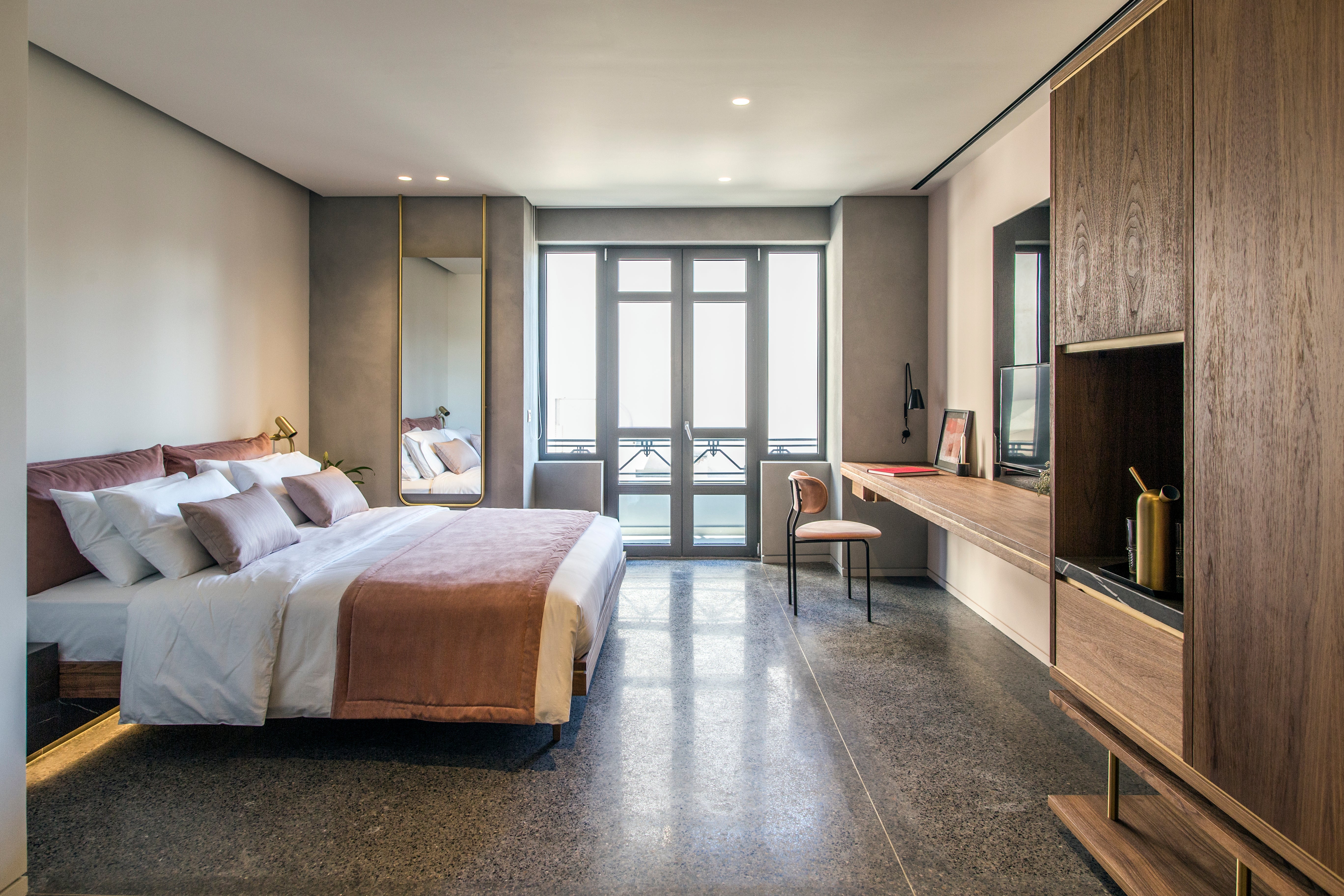 Floor-to-ceiling windows make rooms at Perianth light and spacious