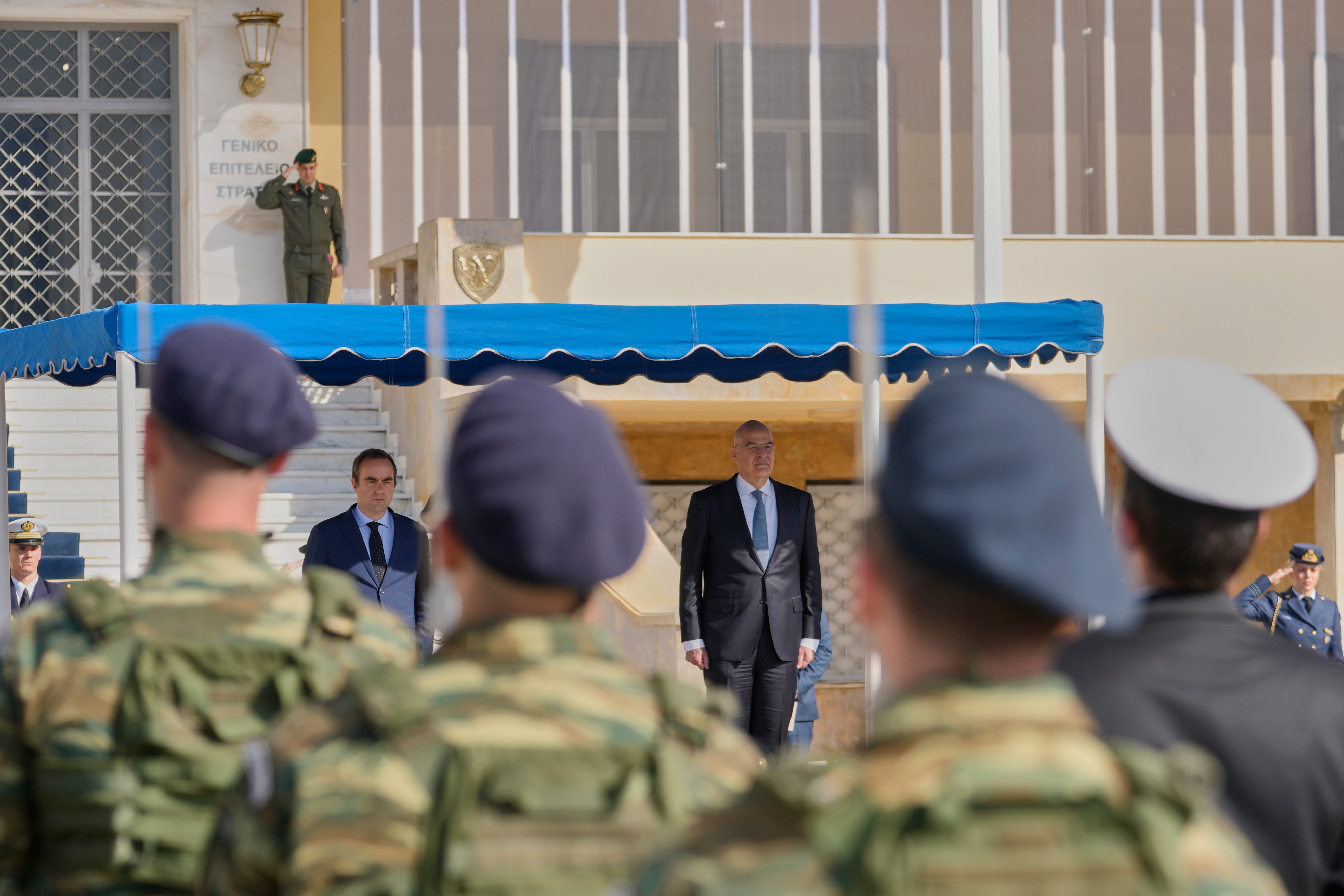 Greek Defense Minister Nikos Dendias, right, and his French counterpart Sebastien Lecornu, left