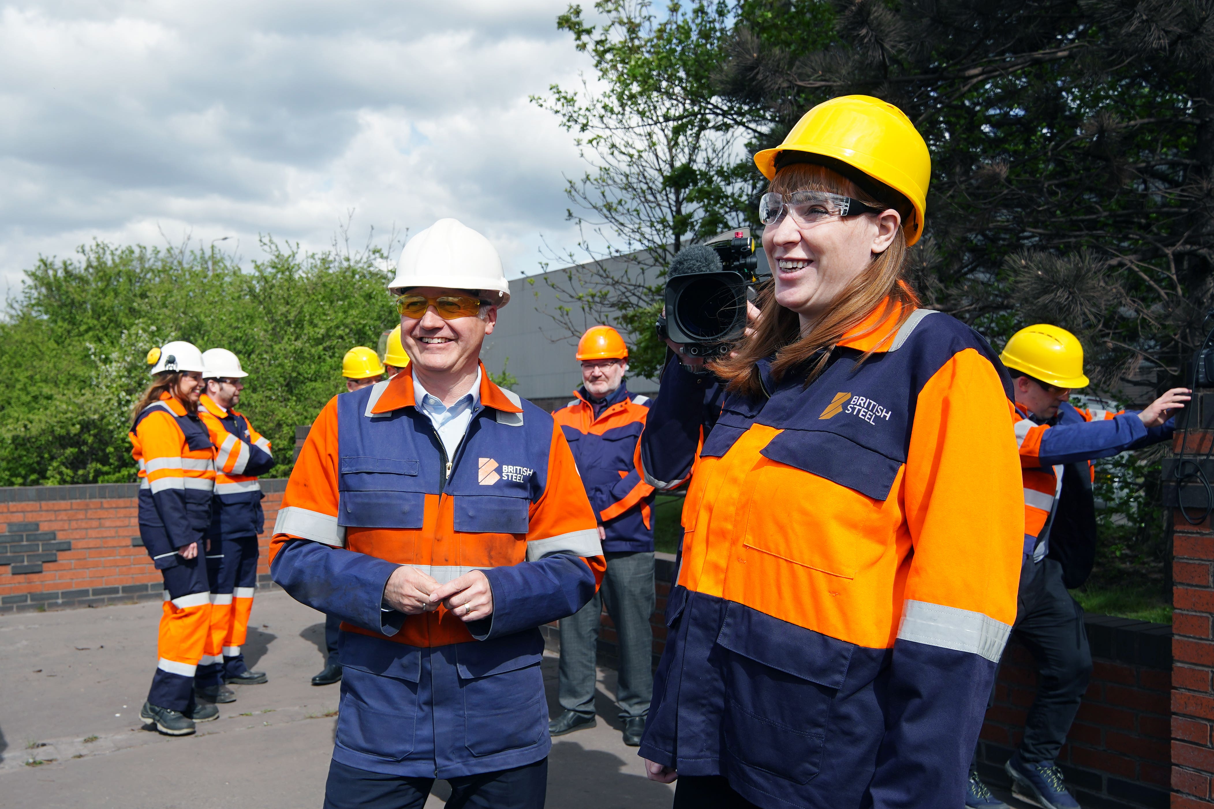 Deputy Prime Minister Angela Rayner and technical director Chris Vaughan view the blast furnaces during her visit to the British Steel site in Scunthorpe (Peter Byrne/PA)
