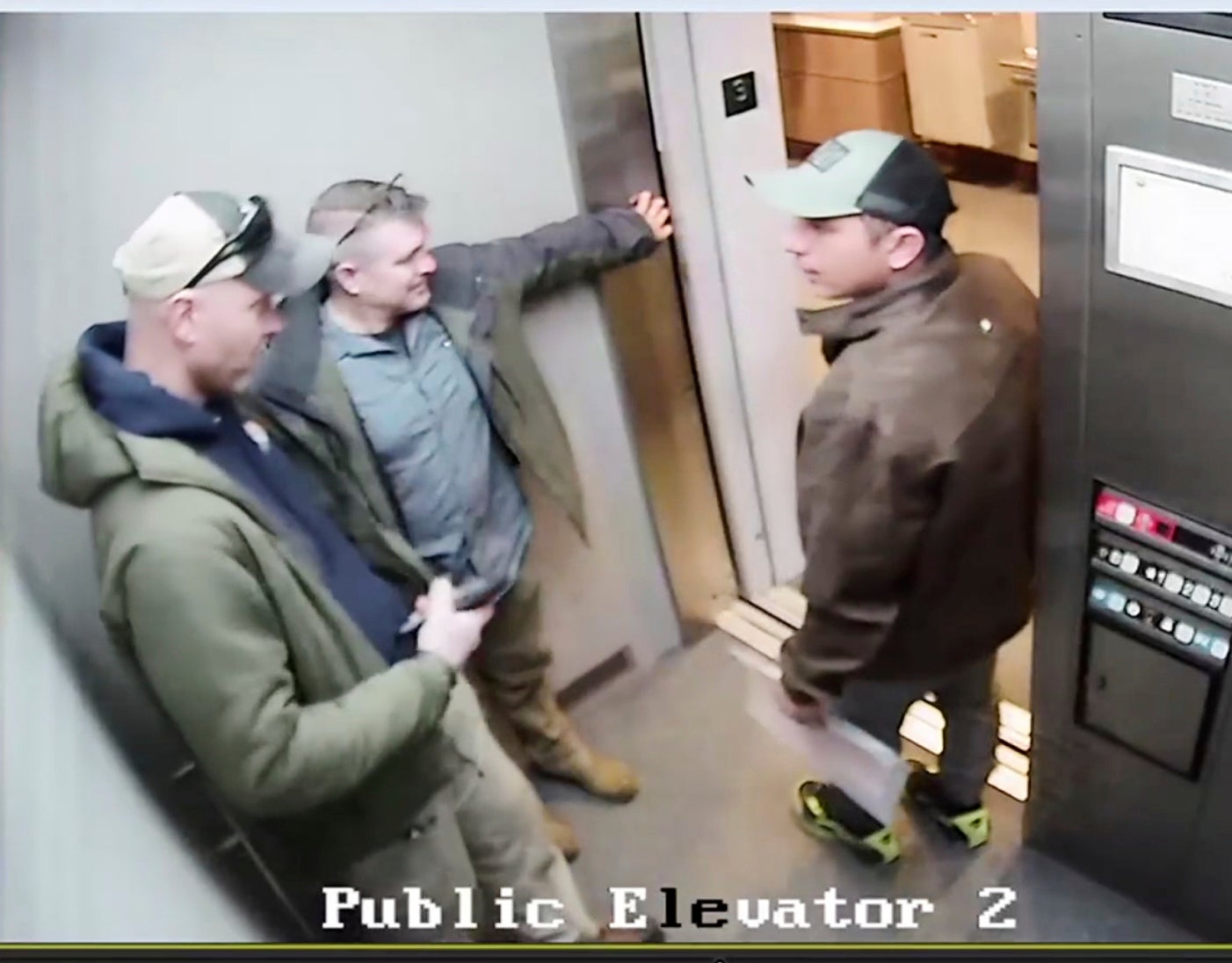 After the two other men exit the lift, an agent taps Marquez Colmenarez on the shoulder as he also prepares to exit. He turns to face the man, before turning around and attempting to quickly leave the elevator, at which point he is grabbed by the two agents