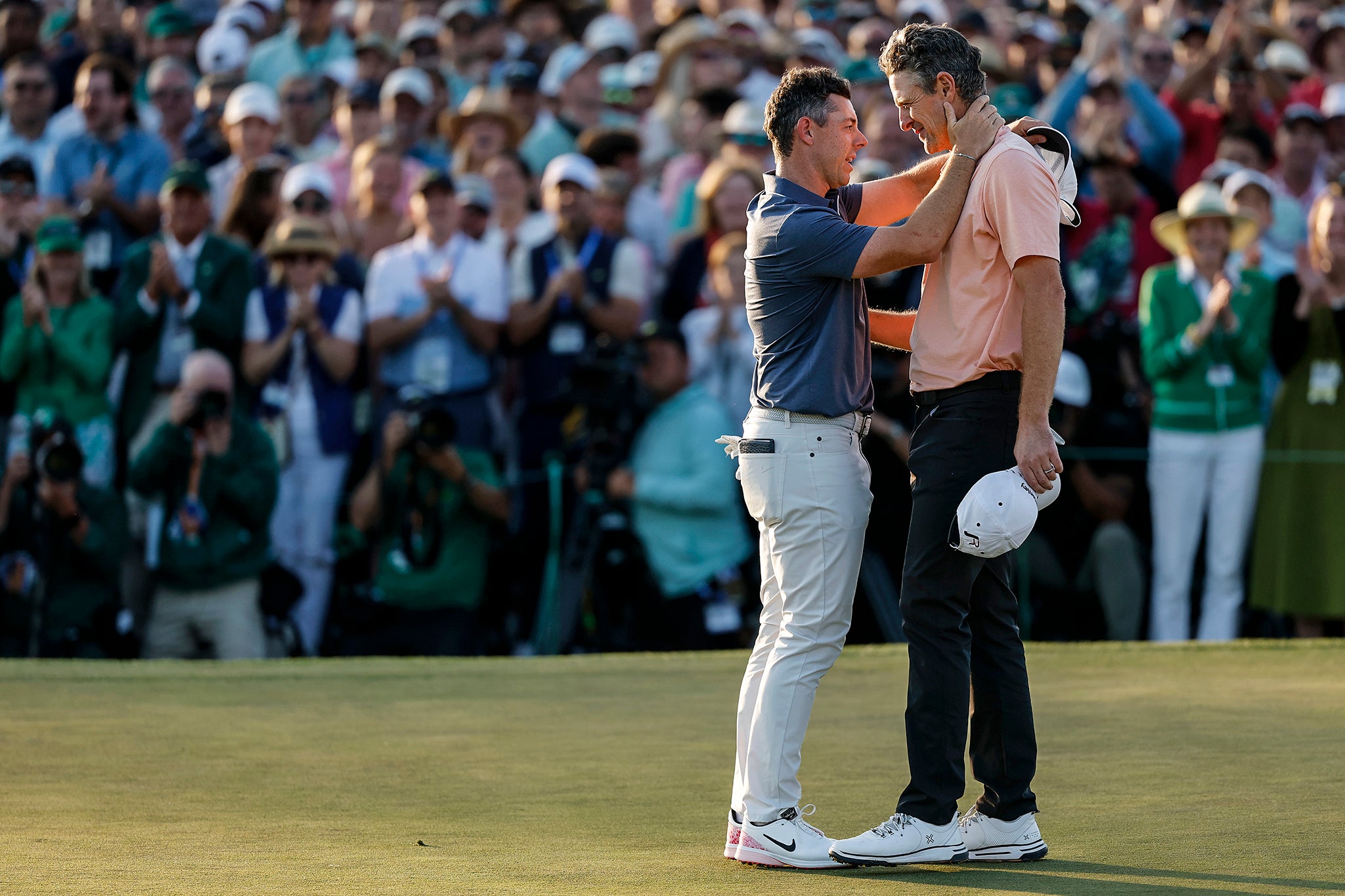 Justin Rose (right) was denied Masters triumph by Rory McIlroy