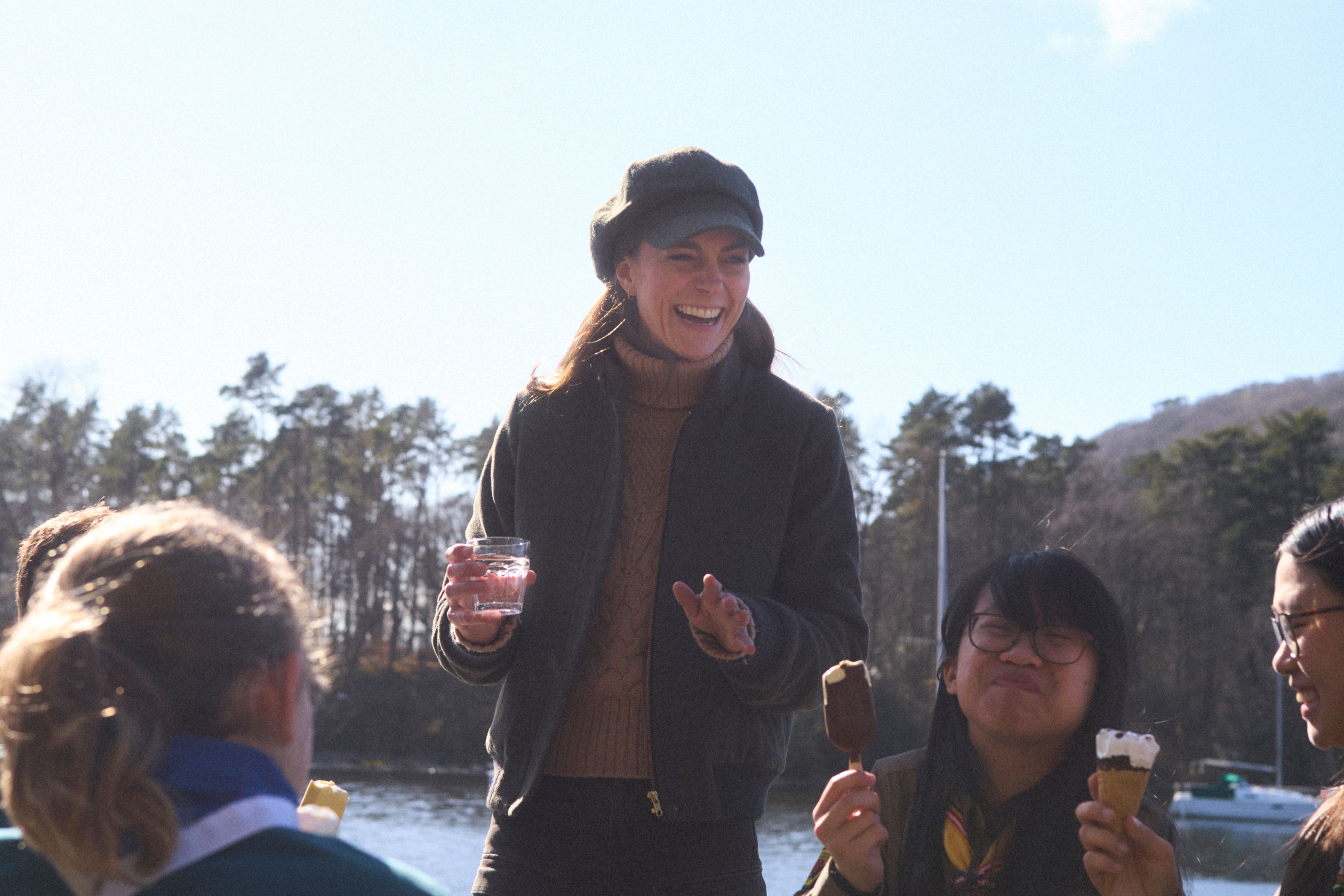 Kate with Jocey Yang (right) and Esmee Chan (far right) from 1st Buddha Light Explorer Scouts, Stretford, Greater Manchester (Kensington Palace/PA)
