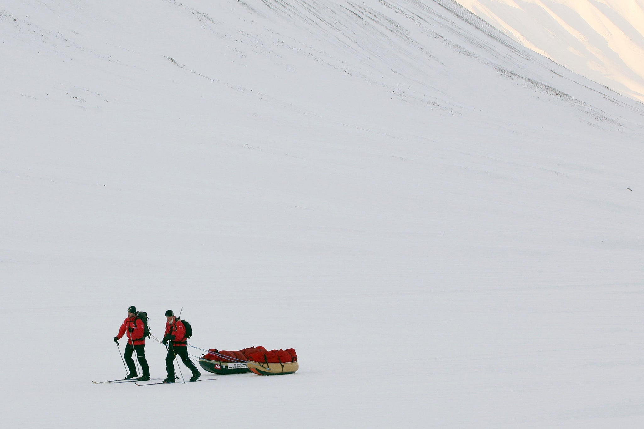 Prince Harry on his way to set up his tent with Henry Cookson as he joins the Walking with the Wounded team who gather on the island of Spitsbergen, situated between the Norwegian mainland and the North Pole for their last days of training before setting off to walk to the North Pole. 30 March 2011