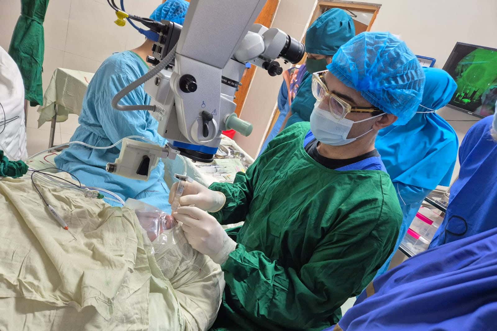 Mahi Muqit of Moorfields Eye Hospital in London in theatre in Bangladesh (Moorfields Eye Hospital/PA)