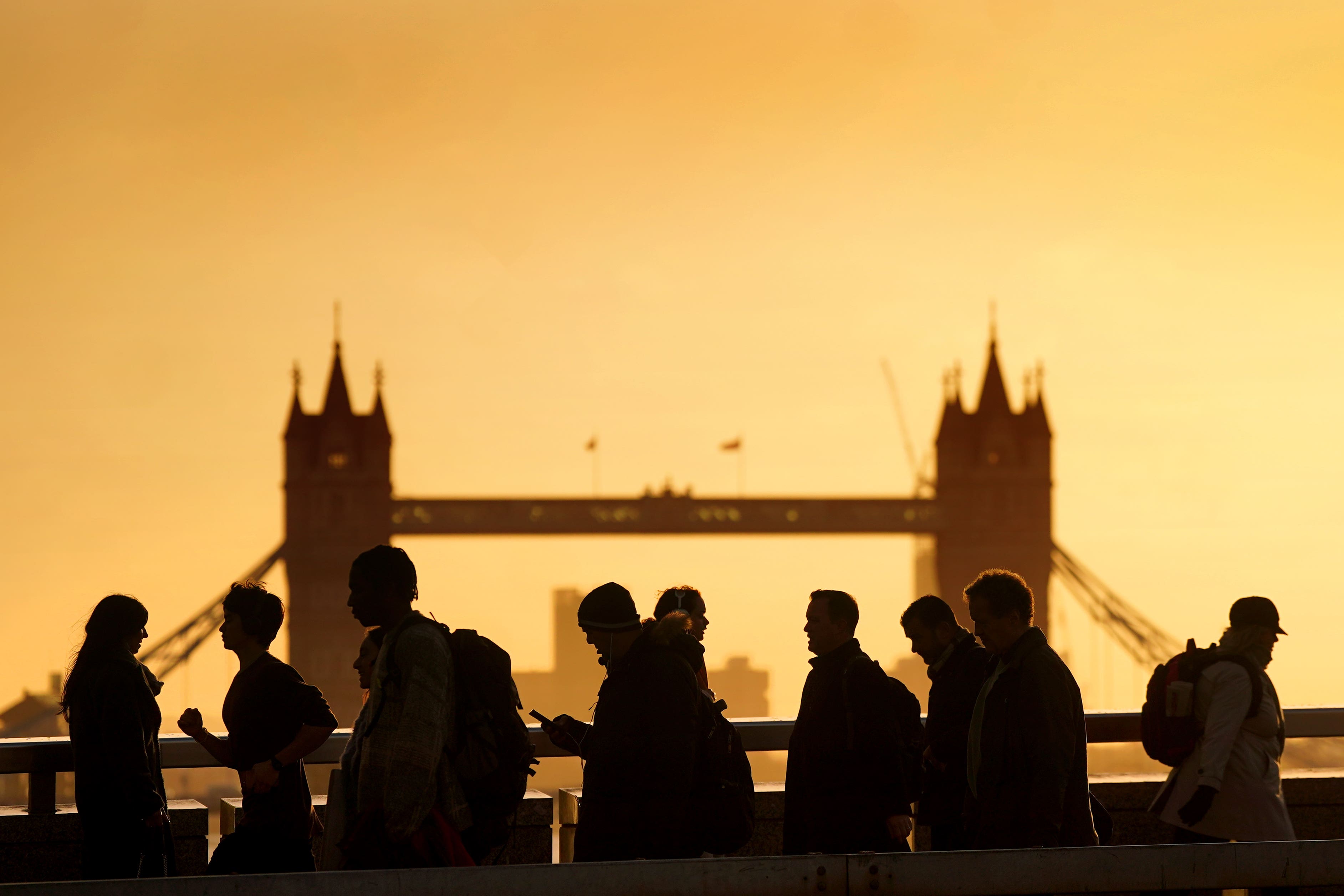 Commuters on London Bridge (Victoria Jones/PA)