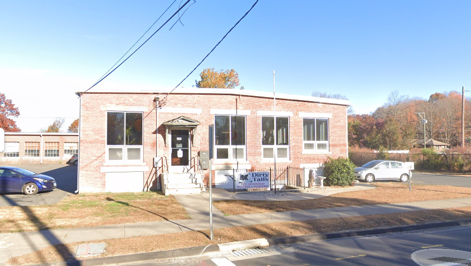 The Connecticut pet owner has accused Dirty Tails Pet Groomers in Plainville (pictured) of snipping off her dog's tongue