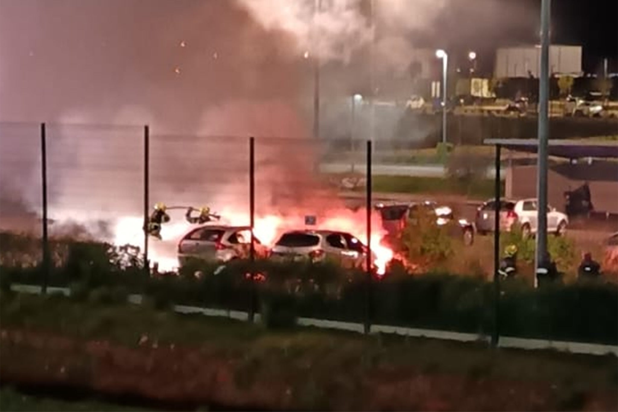 <p>Cars burn in a car park of Valence prison overnight</p>